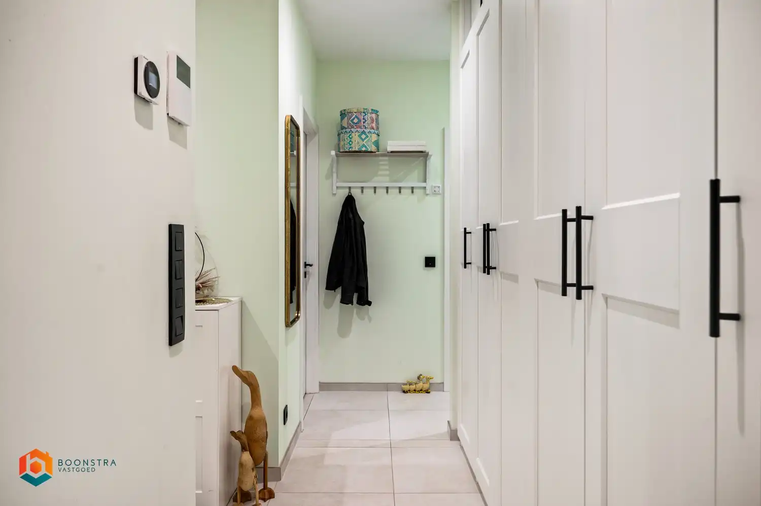 Ruim, energiezuinig gelijkvloers appartement met 2 slaapkamers en tuin foto 13