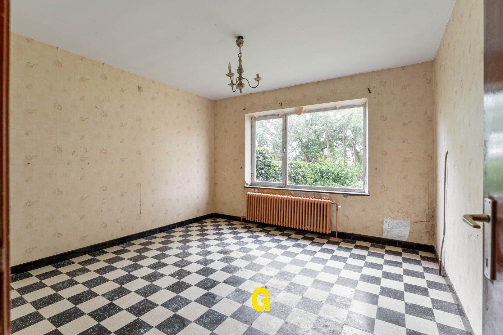 Grondig te renoveren halfvrijstaande woning met tuin op 15a 12ca in het landelijke Alt-Hoeselt foto 11