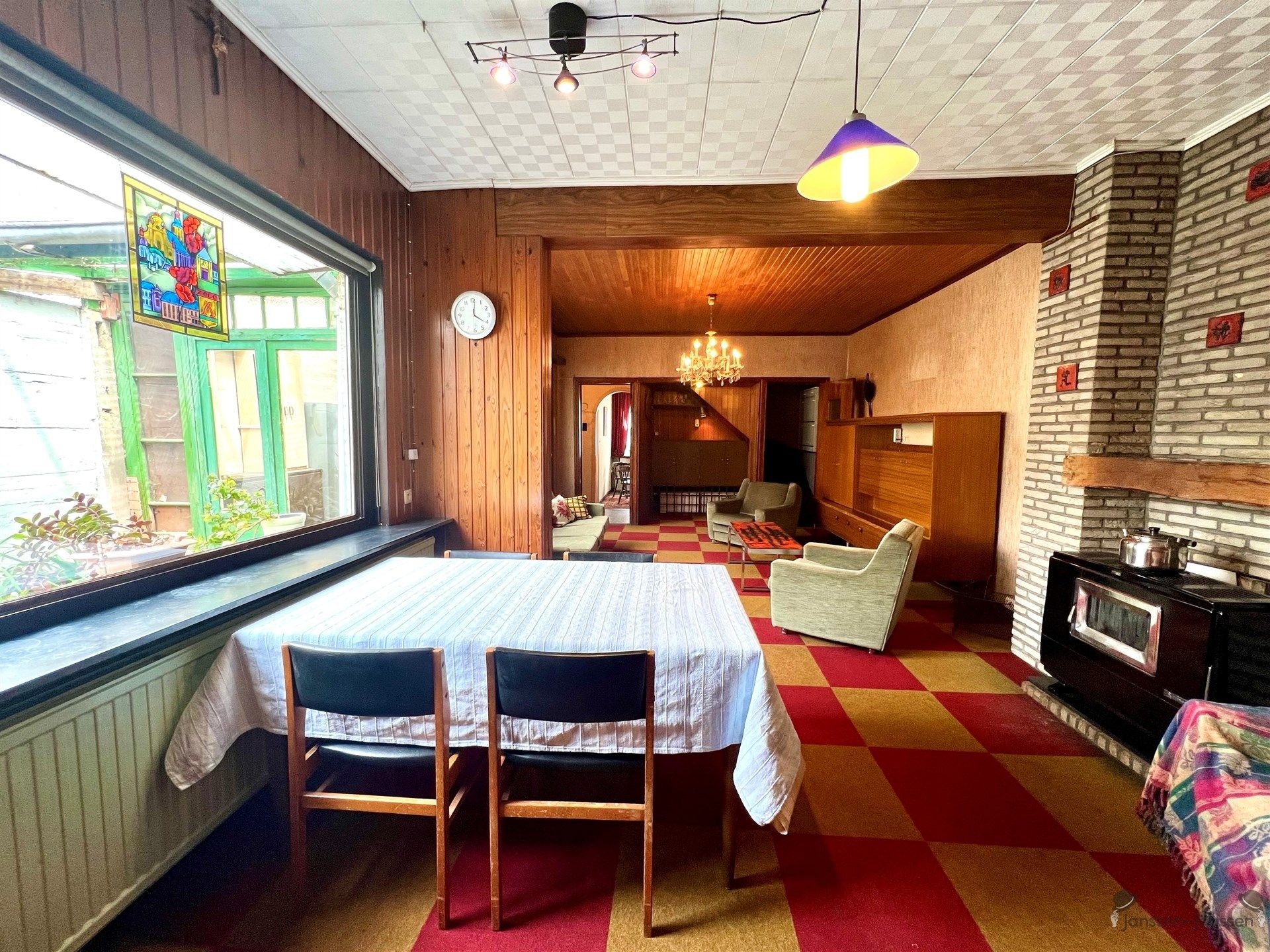 Te renoveren halfopen bebouwing met garage foto 4