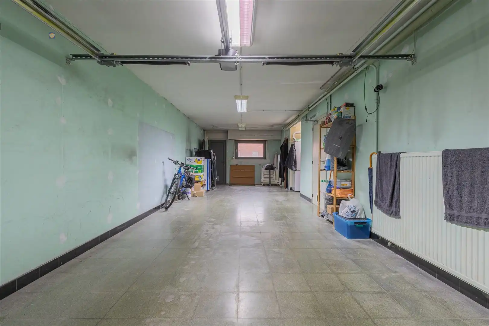 Ruime bel-etage met 3 slaapkamers, grote garage en gezellige tuin foto 16