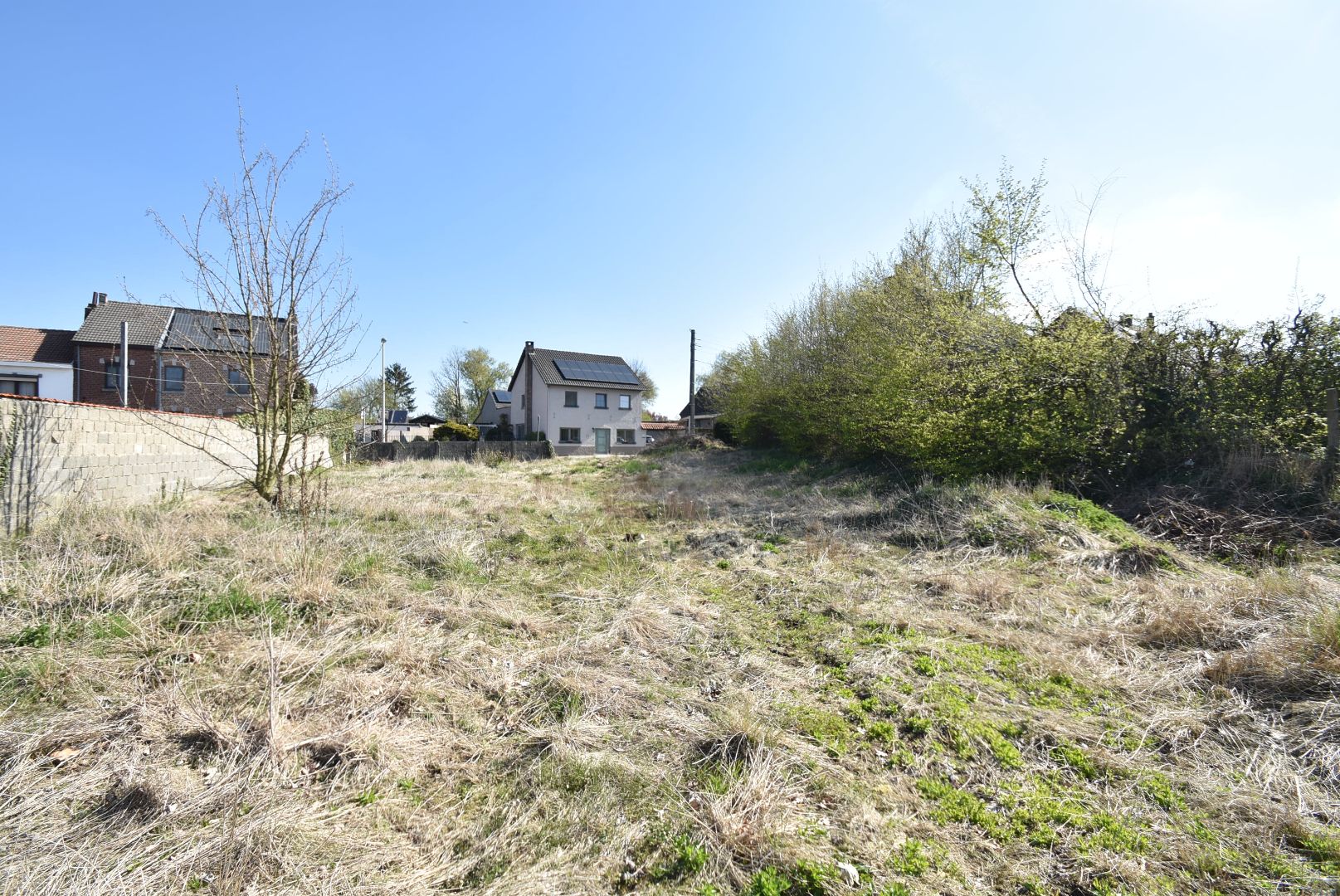 Perceel bouwgrond bestemd voor open bebouwing op 7a 96ca - 21,95 m breedte aan de straatzijde - zuid-gerichte tuin foto 7