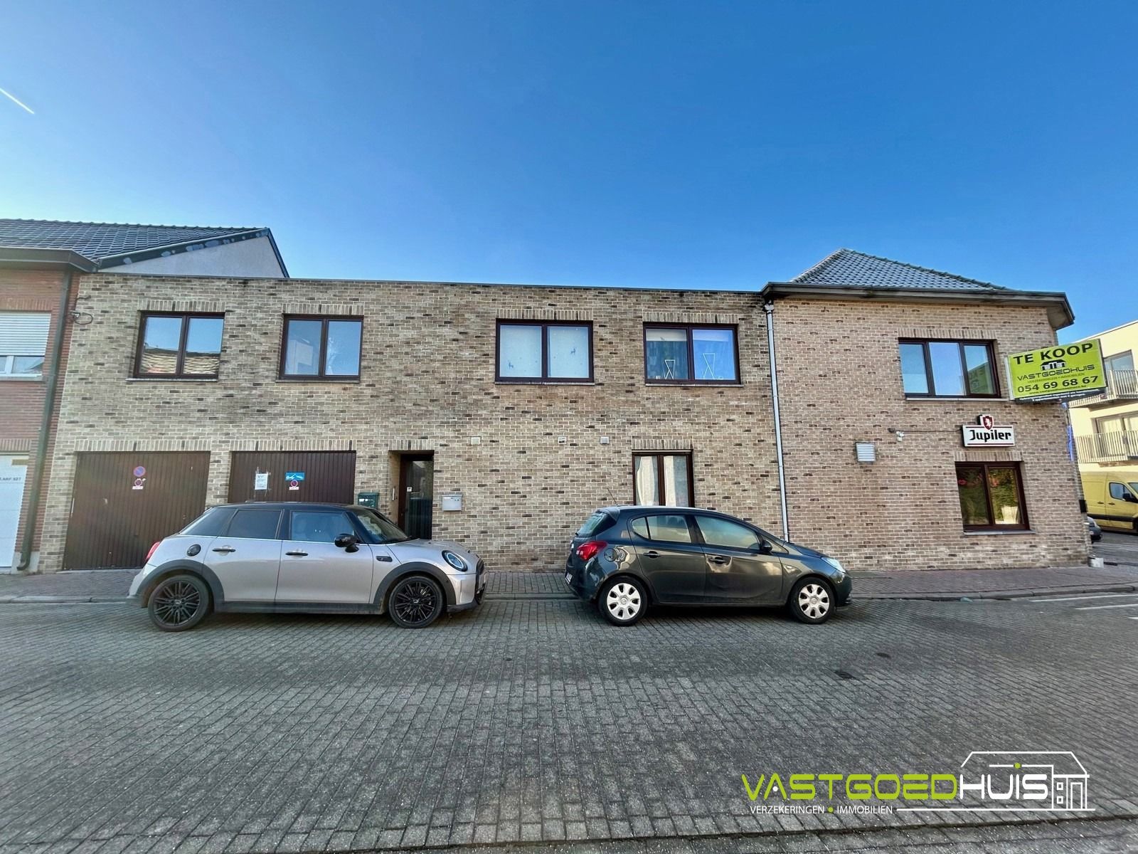 Opbrengsteigendom: handelspand, 2 appartementen en 2 garages foto 3