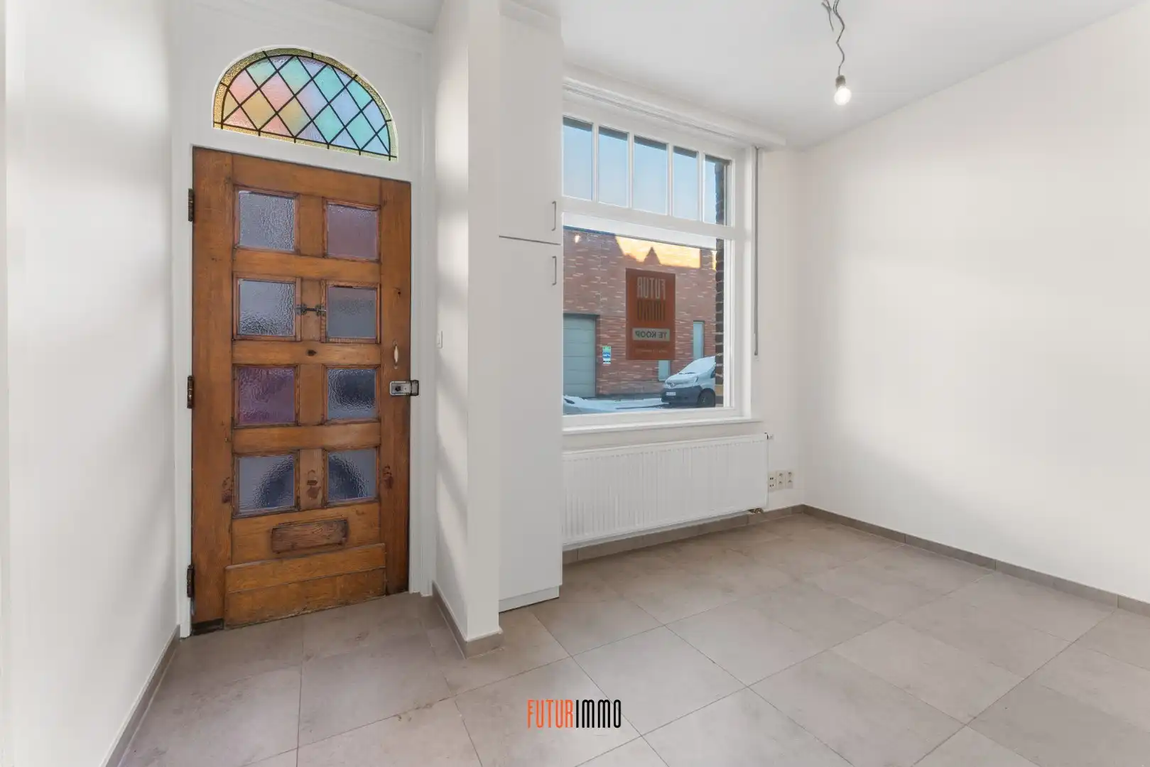 Karaktervolle stadswoning met authentieke gevel foto 2