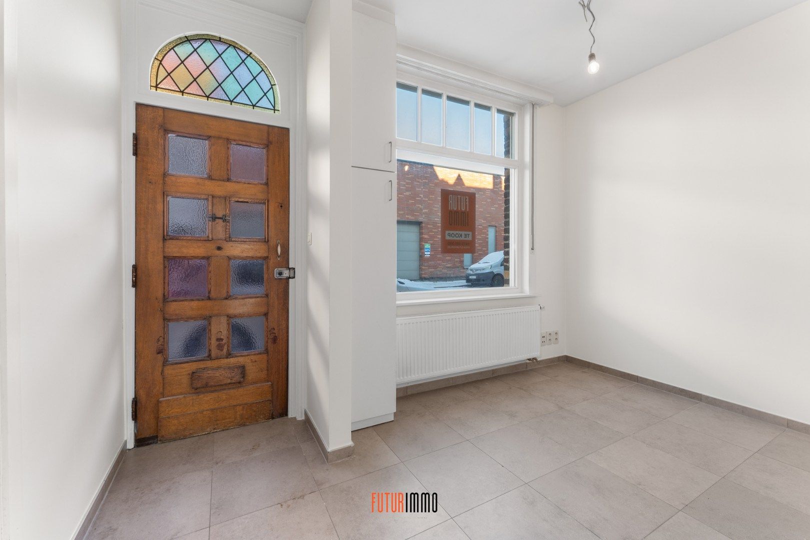 Karaktervolle stadswoning met authentieke gevel foto 2