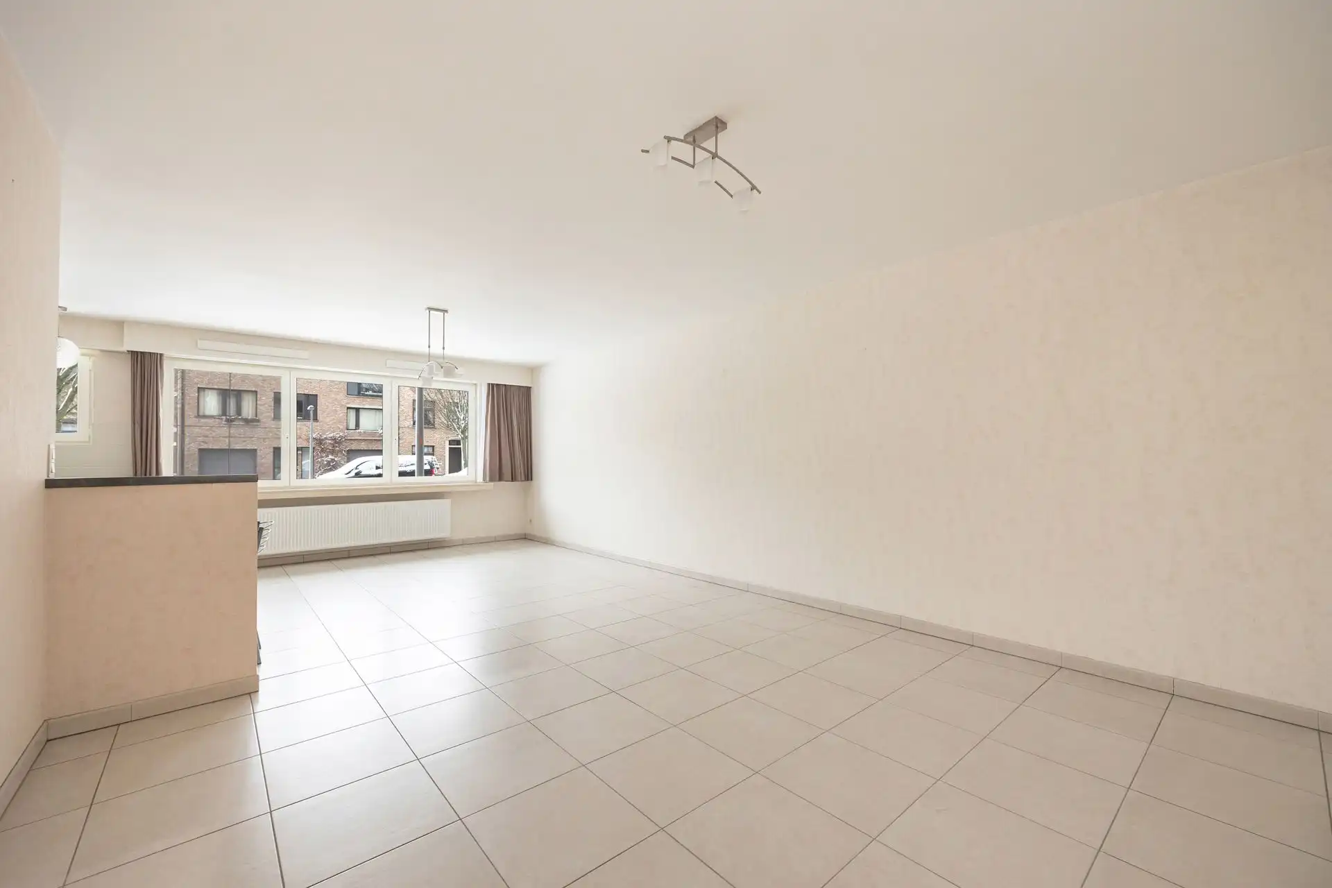 Gelijkvloersappartement met grote tuin & garage foto 2