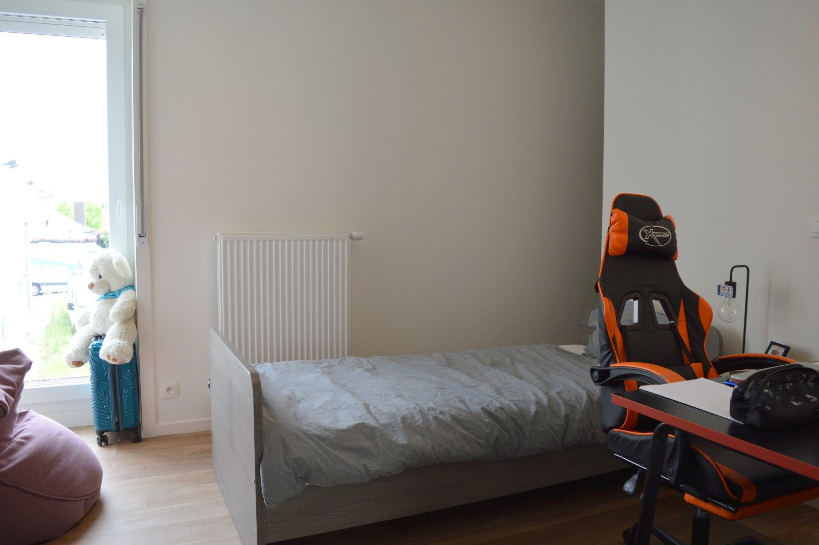 Mooie rijwoning met zonnige tuin op het zuidoosten in Heule met 3 slaapkamers foto 11
