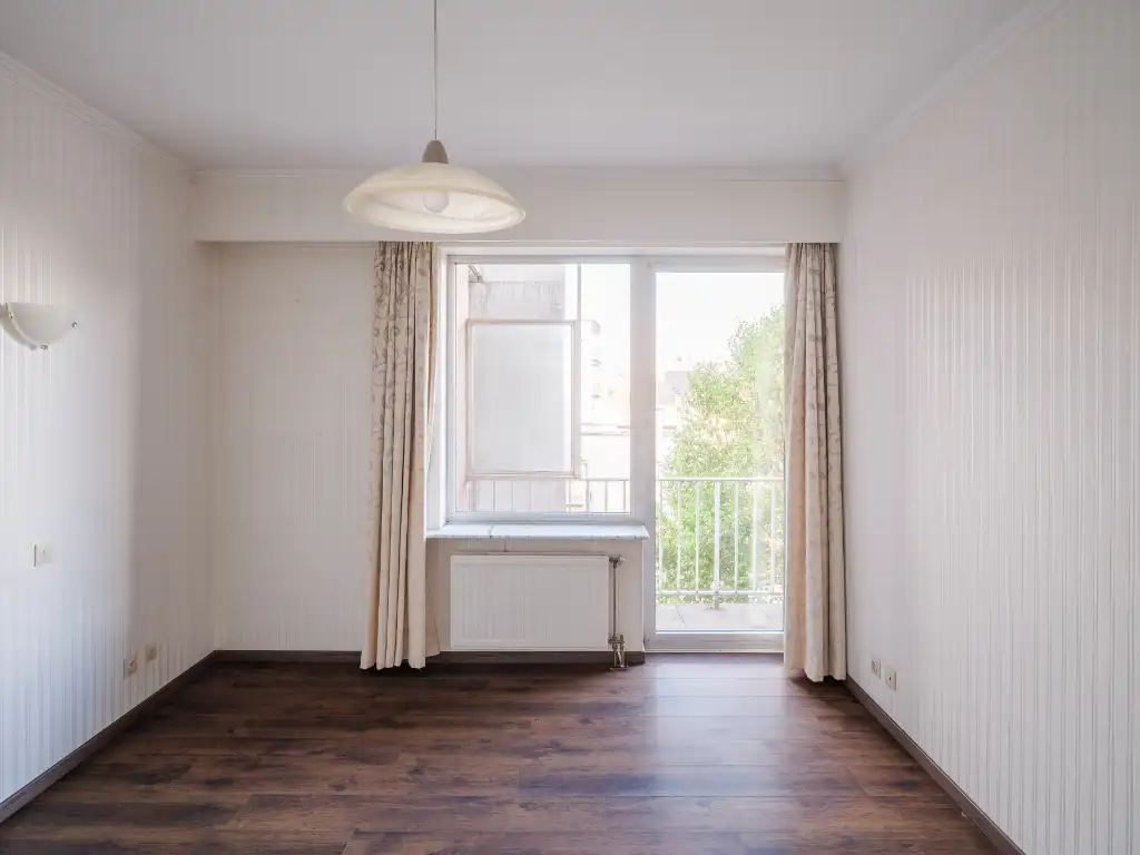 Op te frissen drieslaapkamerappartement met open zicht over het Citadelpark. foto 8