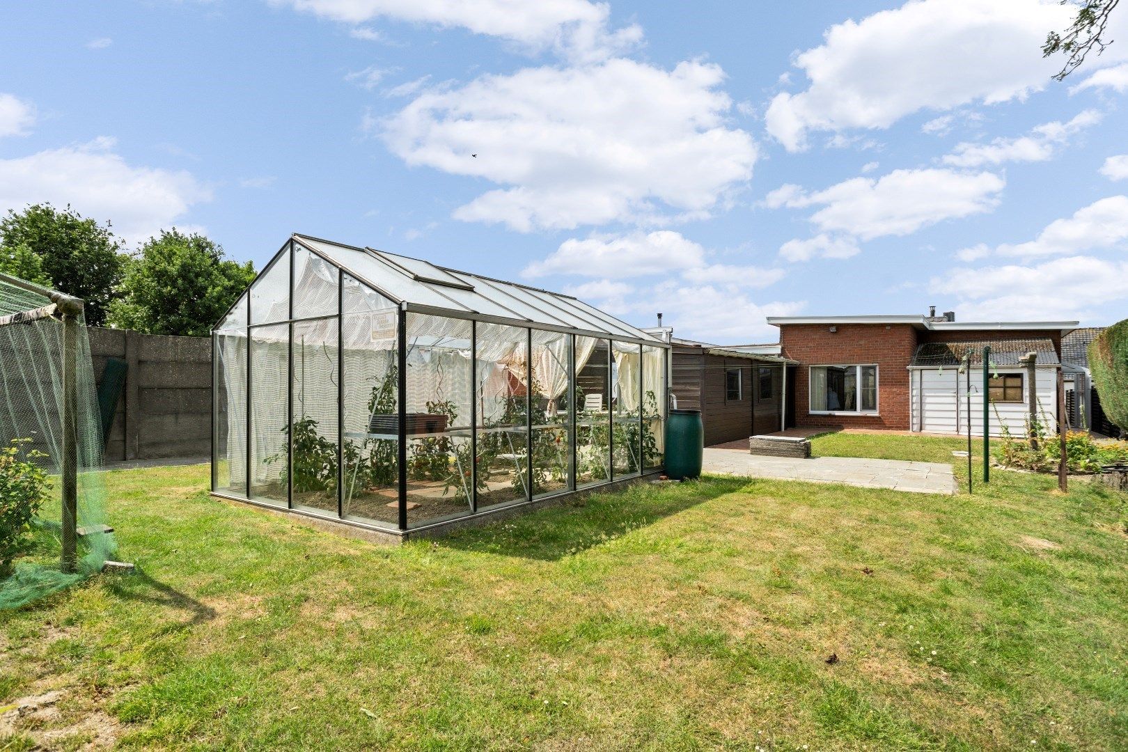 Goed onderhouden gelijkvloerswoning op ruim perceel van 700m² foto 26