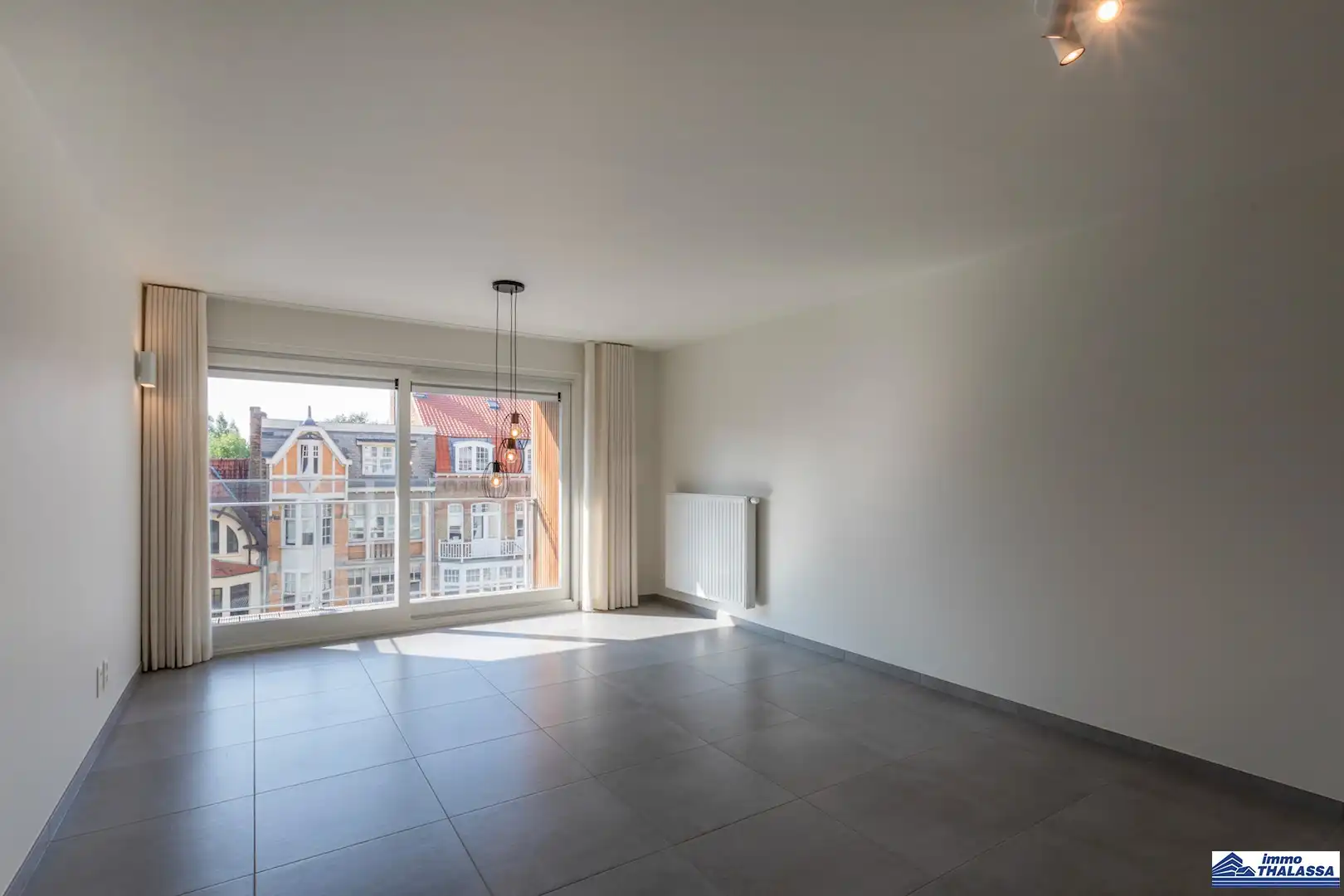Zongericht woonappartement in hartje De Panne foto 3