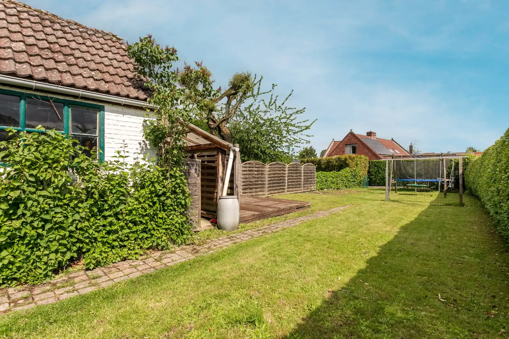 Gerenoveerde 3-gevelwoning met tuin en 4 slaapkamers te Sint-Genesius-Rode foto 12
