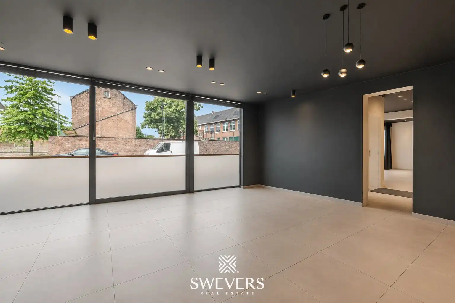 Veelzijdig handelspand met ruim duplex appartement: wonen, ondernemen én investeren onder één dak in centrum Alken foto 9