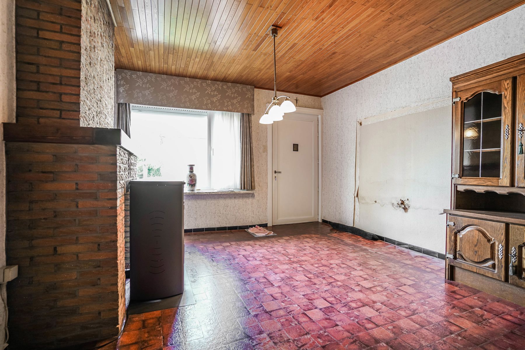 Te renoveren rijwoning met tuin te Steenhuffel foto 5