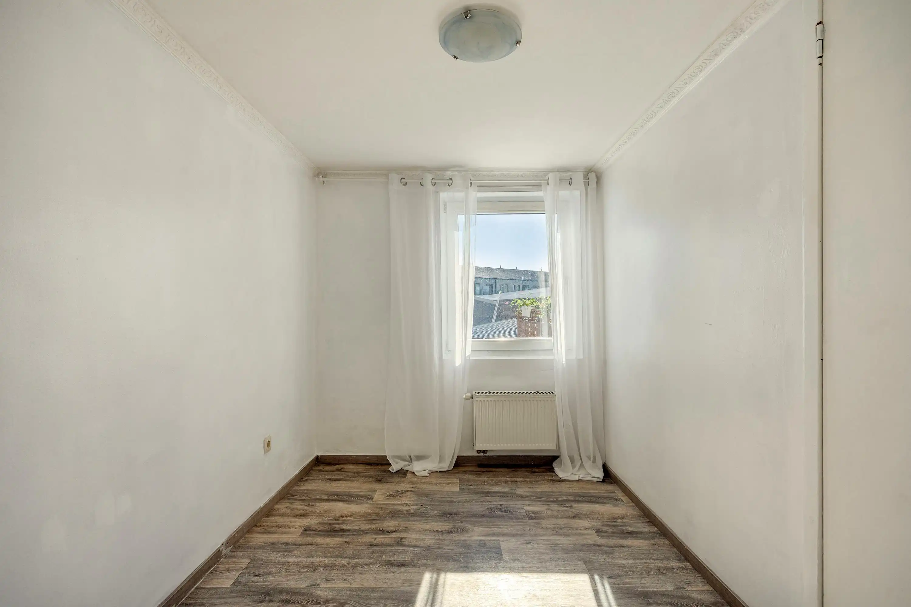 Charmante tweegevelwoning te koop in hartje Strombeek-Bever foto 9