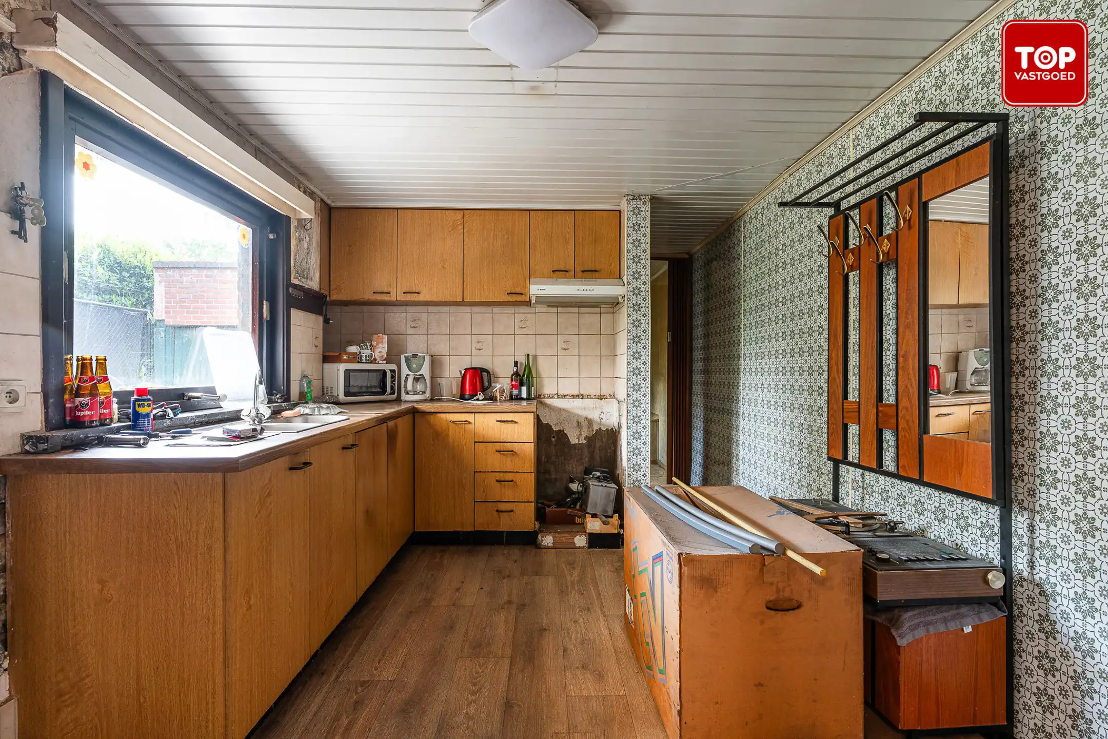 Te renoveren woning met zonnige tuin foto 9