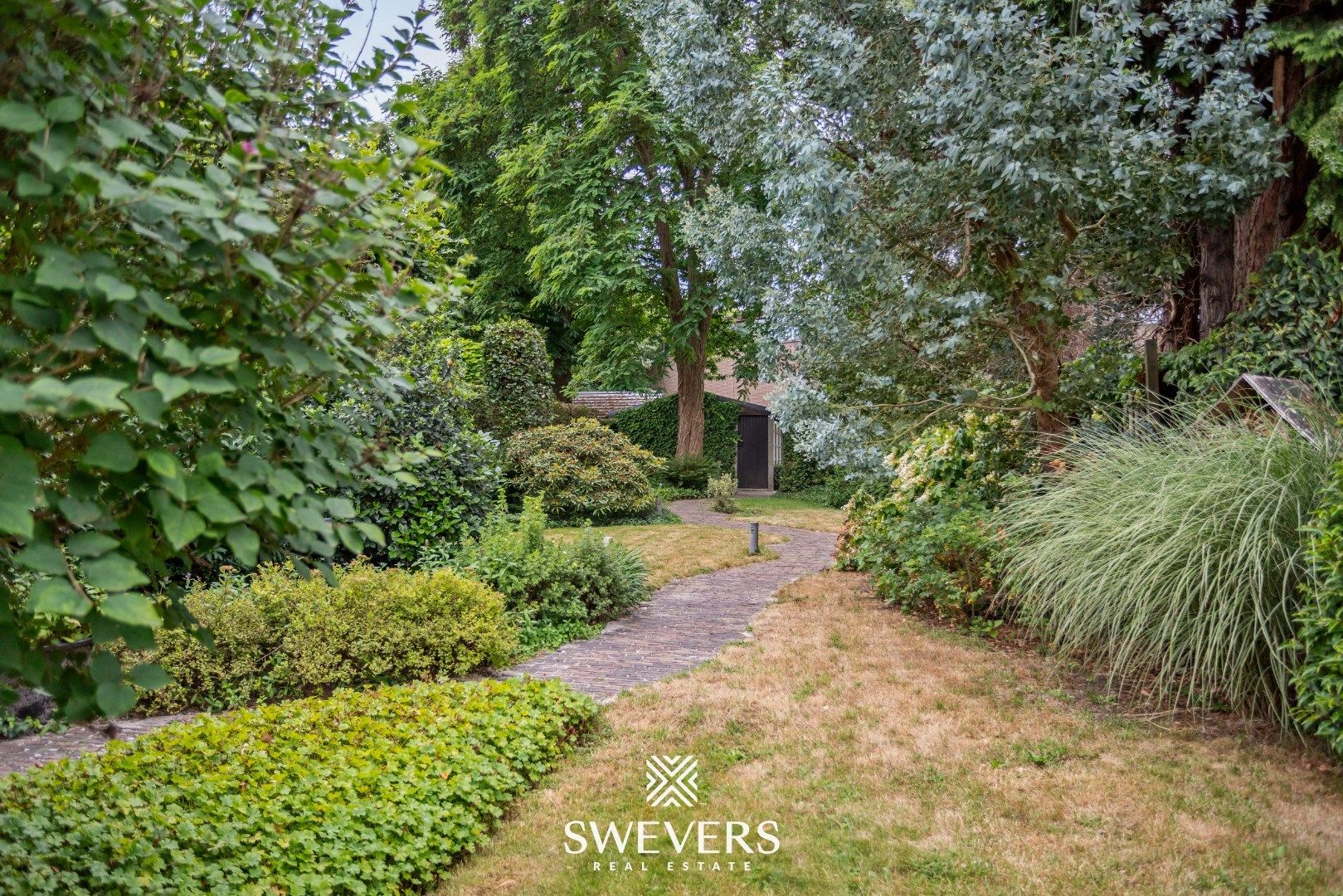 Ruime woning met tal van mogelijkheden in het hart van Tessenderlo-Ham foto 27