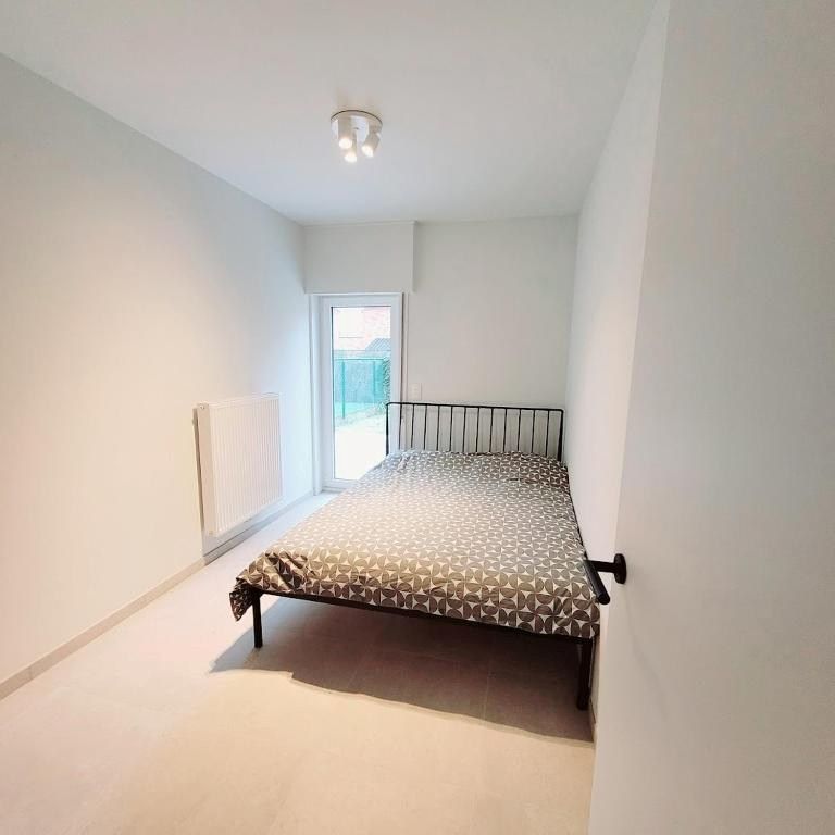 Recent gerenoveerde 2 slaapkamer appartement te Oostduinkerke bad foto 5