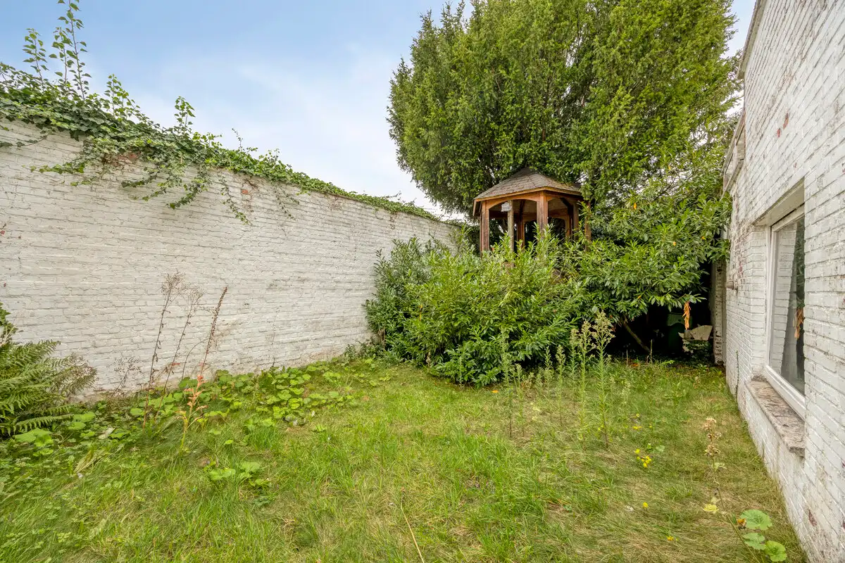 Karaktervolle stadswoning met handelsruimte, tuin en ruime garage in hartje Tongeren foto 21
