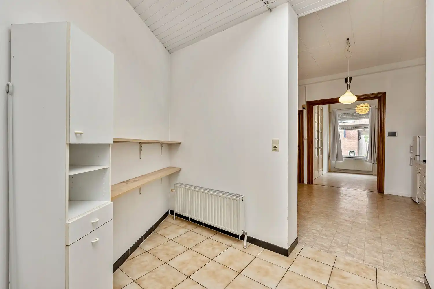 Goed gelegen rijwoning met 2 slaapkamers en een af te werken zolderruimte te Leuven! foto 10