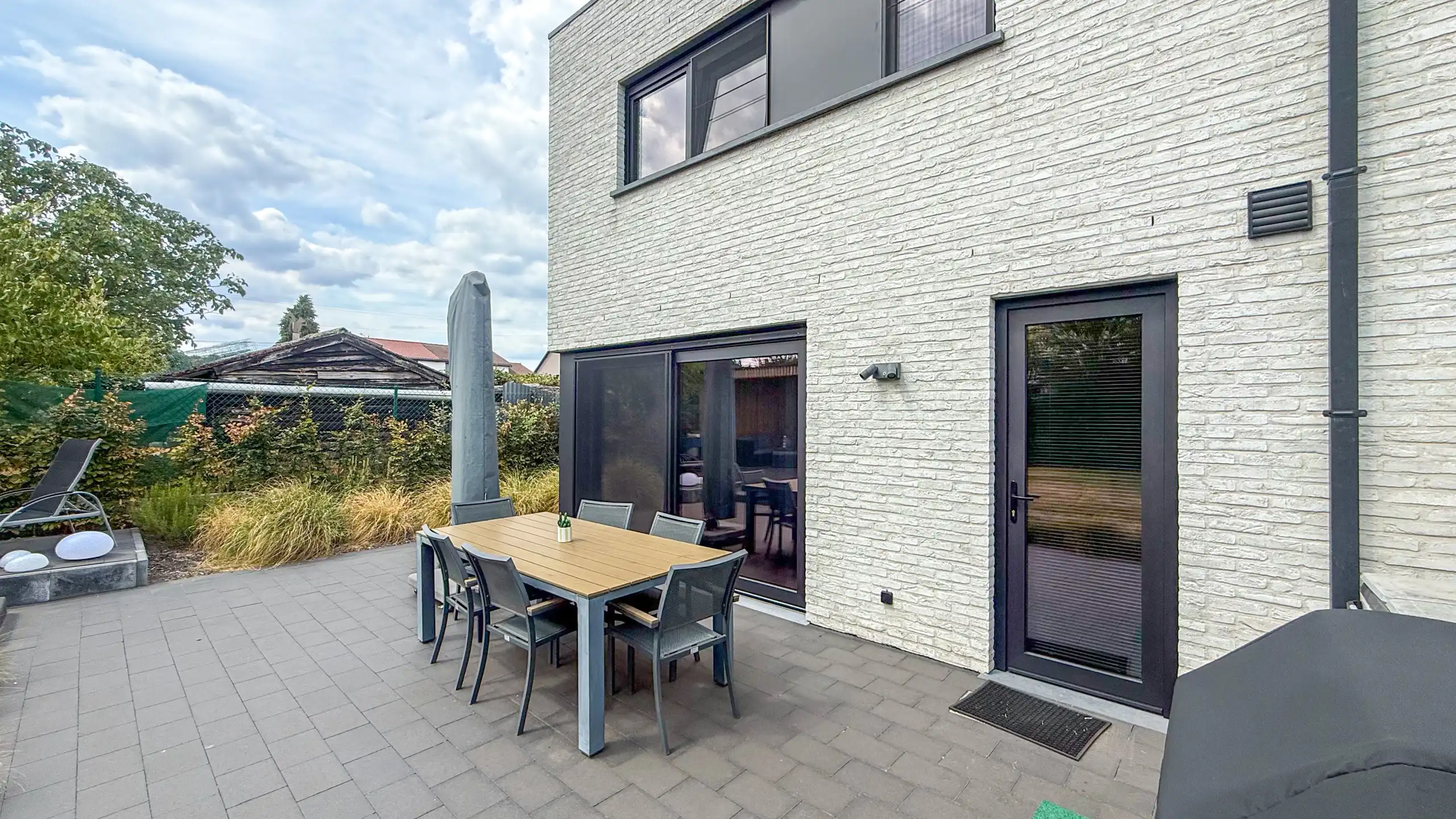 Moderne halfopen woning met 3 slpks en tuin! foto 47