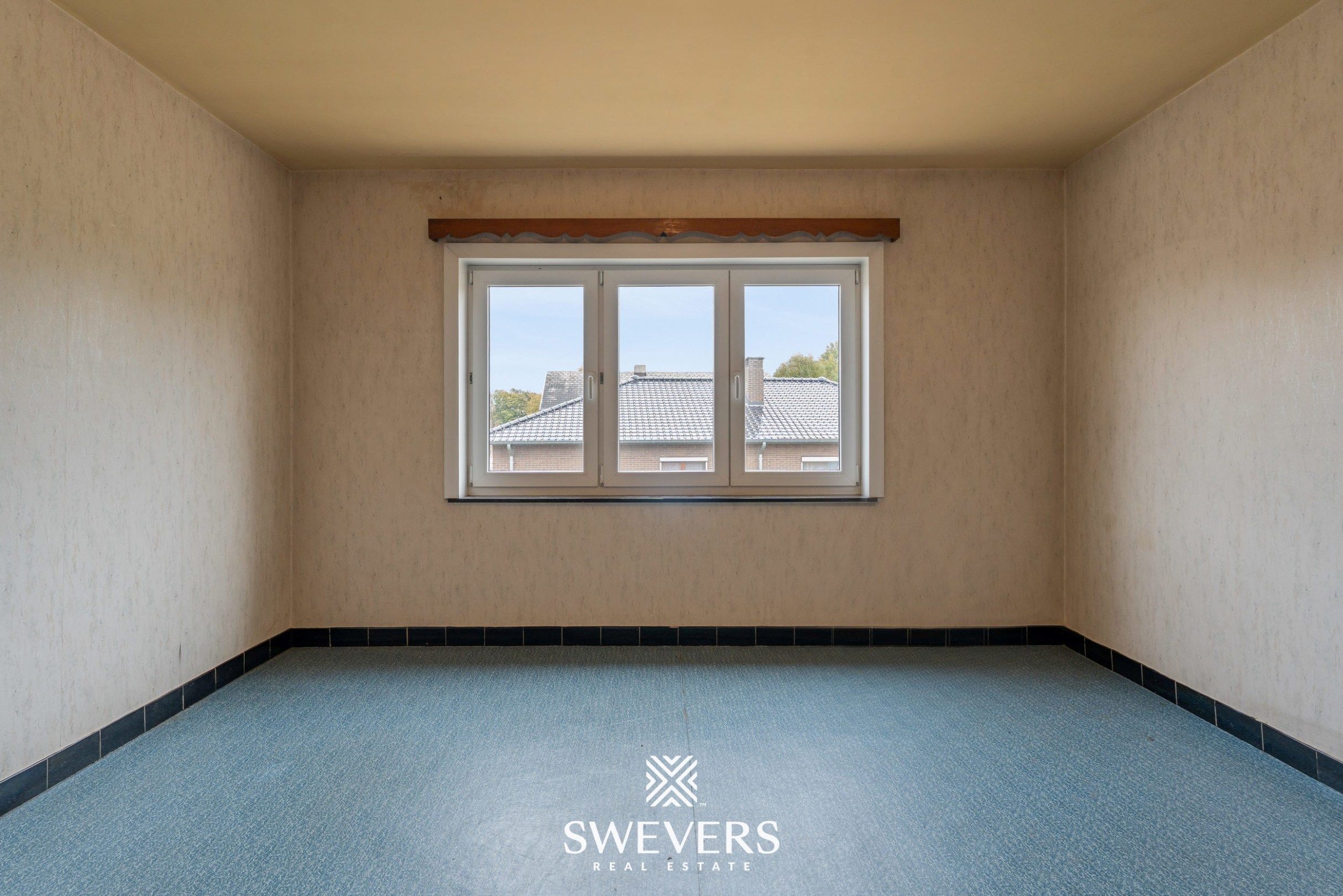 Ruime open bebouwing met potentieel en zuidgerichte tuin in rustige wijk van Houthalen foto 16