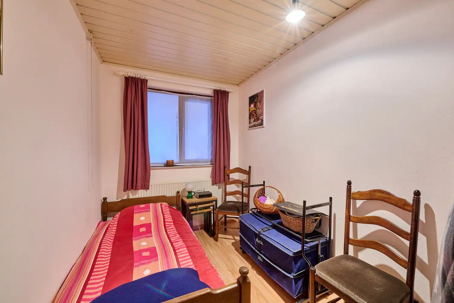 Gezellige en goed onderhouden bungalow met praktische bovenverdieping op fraai aangelegd perceel foto 10