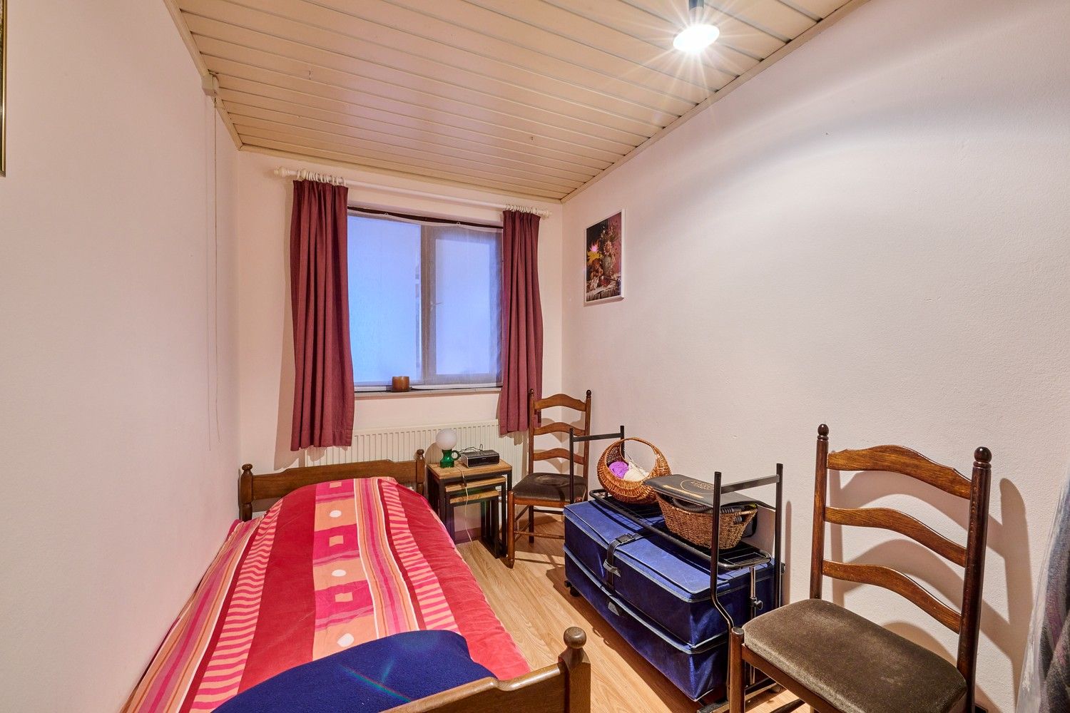 Gezellige en goed onderhouden bungalow met praktische bovenverdieping op fraai aangelegd perceel foto 10