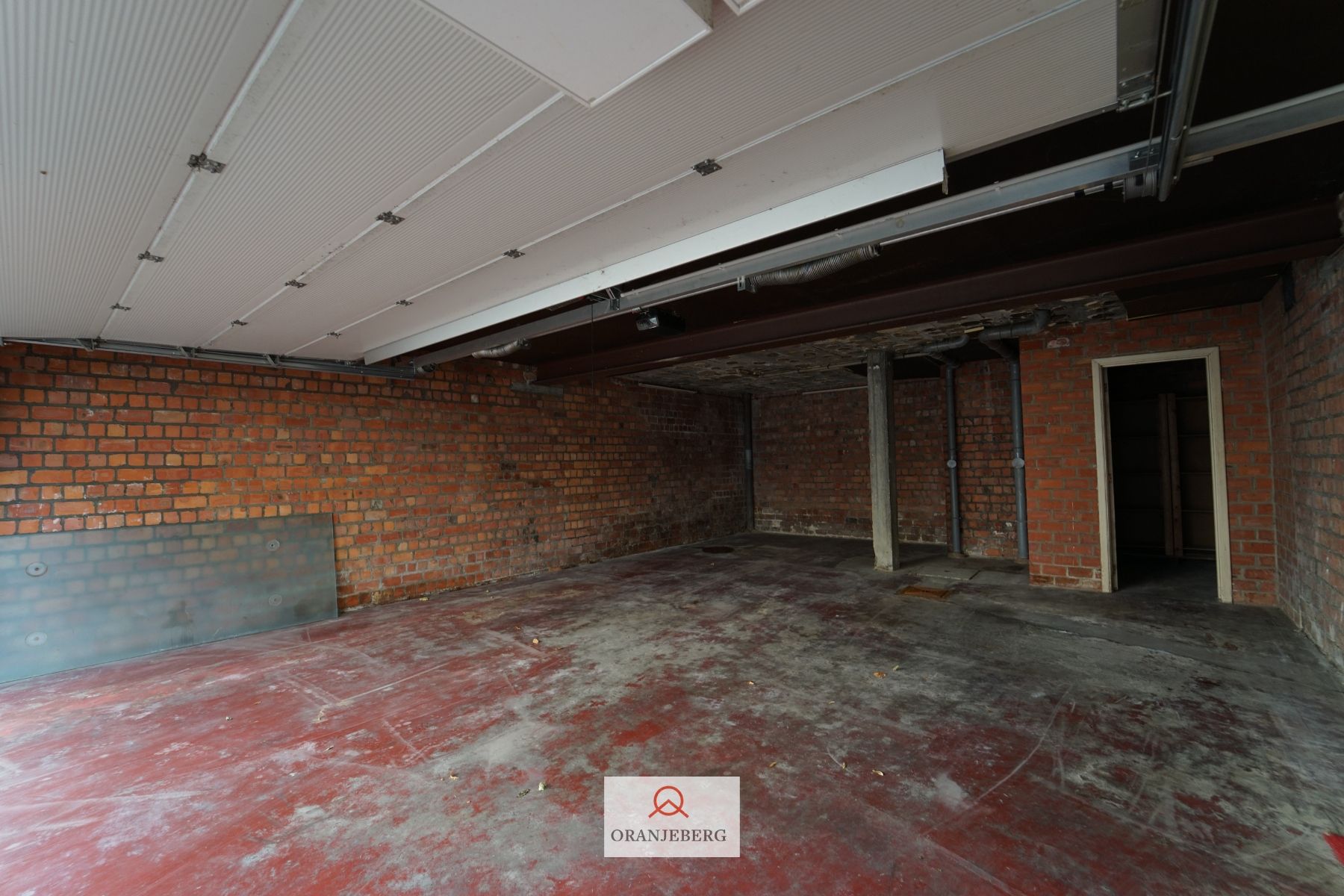 te huur : grote garage voor minimum 2 wagens foto 8