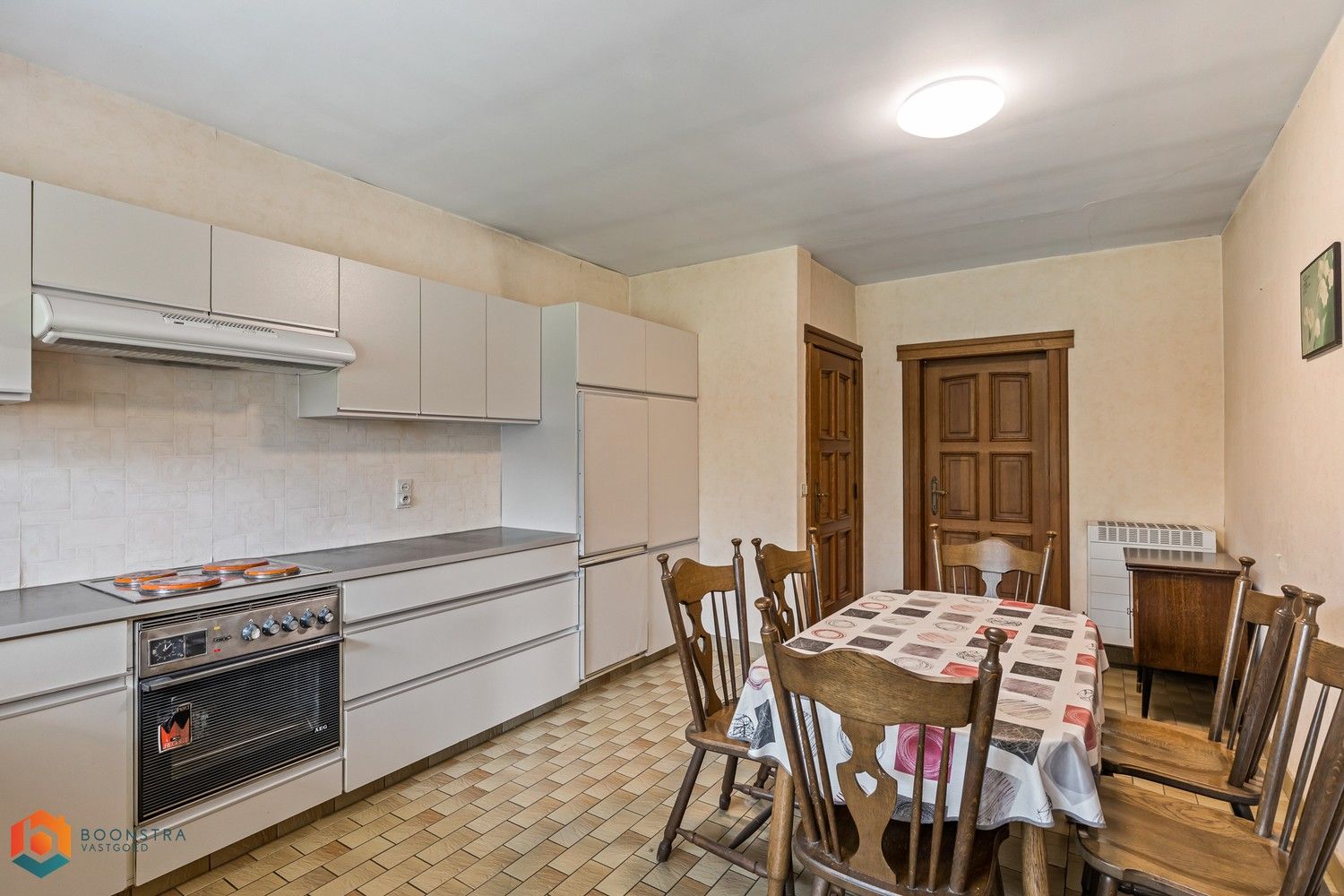 Te renoveren woning met 3 slpkrs op een ruim perceel foto 9