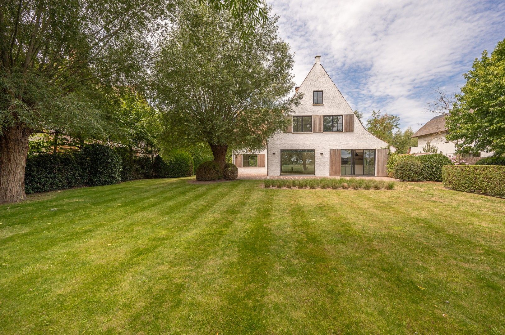 Alleenstaande villa genietend van prachtige open zichten op de polders. foto 31