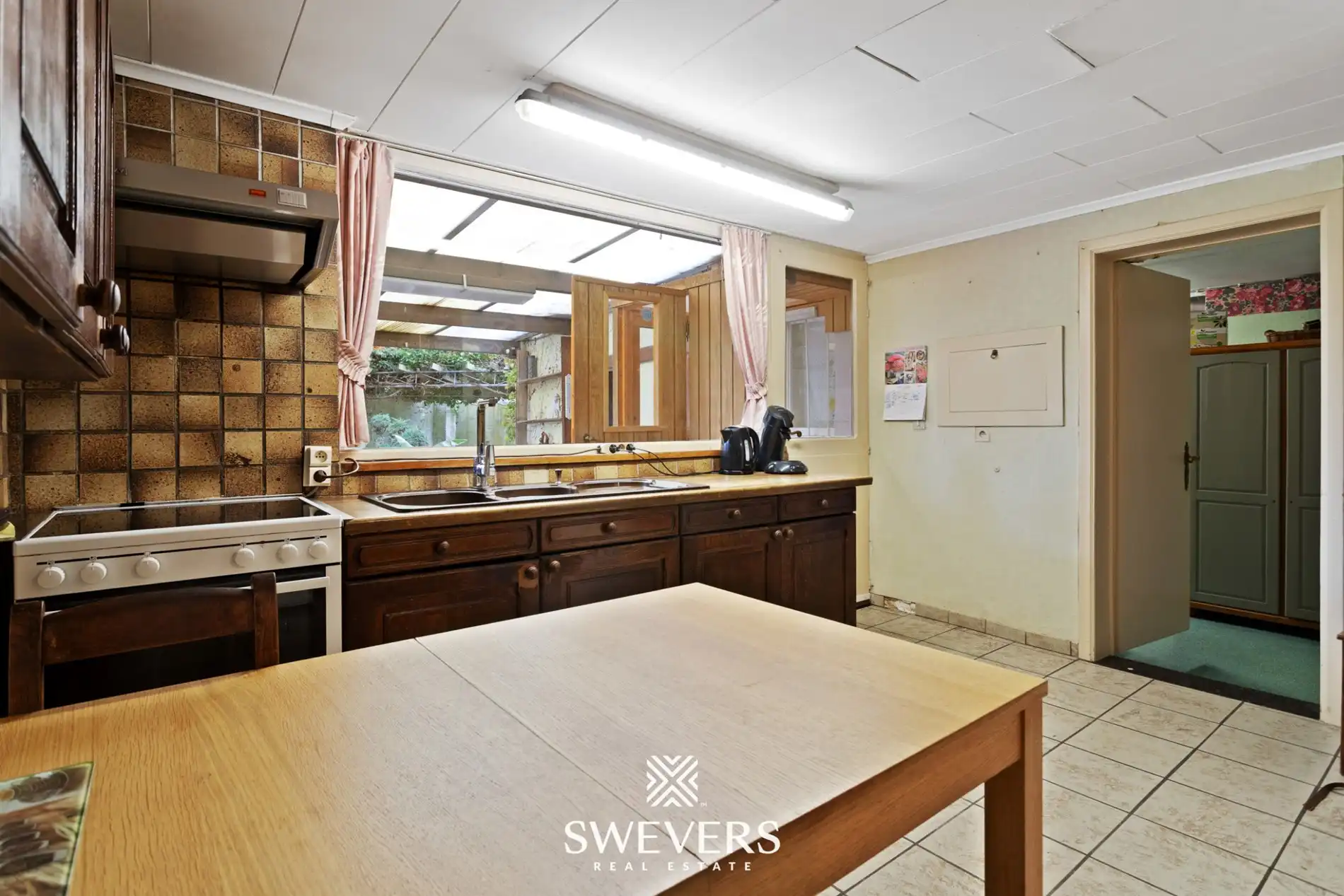 Zeer solide woning met renovatiepotentieel op 10a 18ca  foto 8