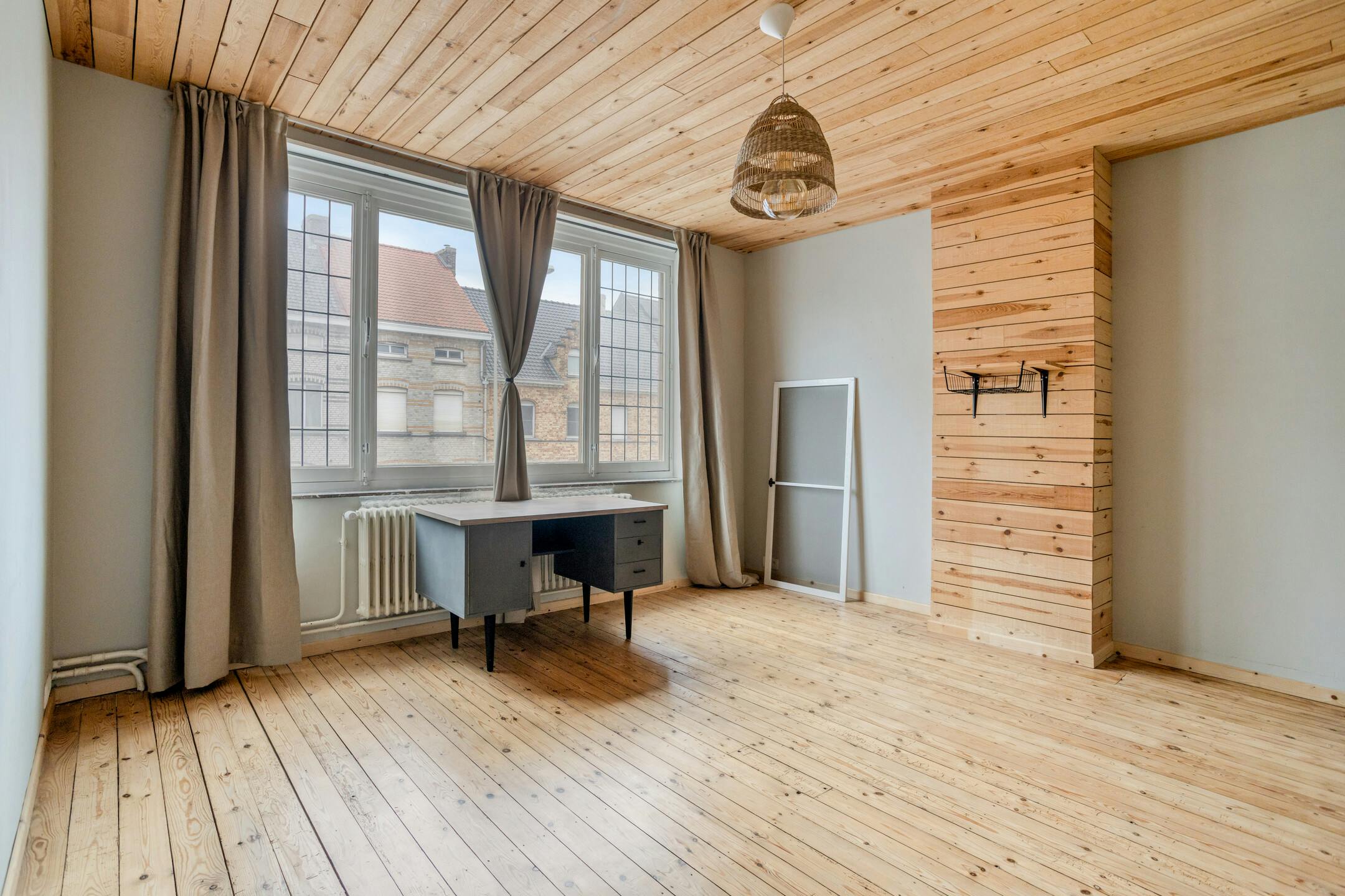 Lichtrijk huis met 4 slaapkamers en zuidwest gerichte tuin in Ieper foto 7