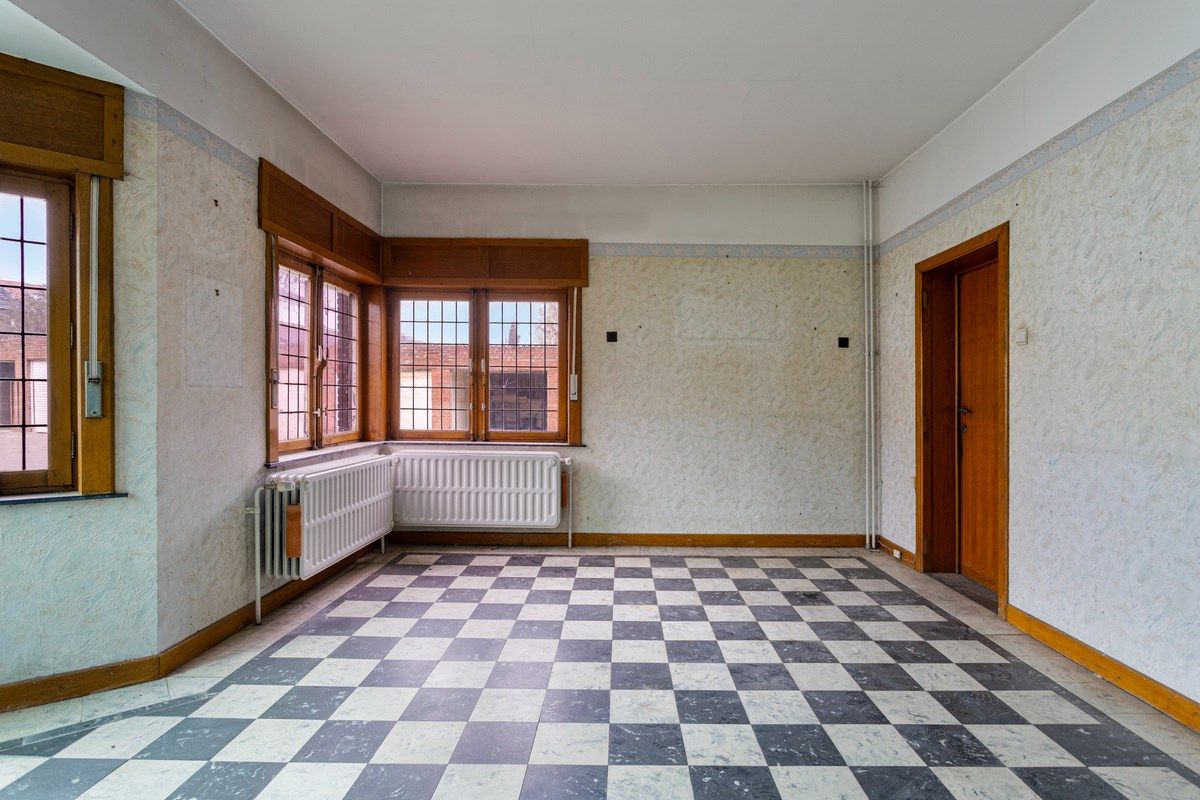 Grote woning in Tongeren centrum met ruimte voor burelen of praktijk foto 4