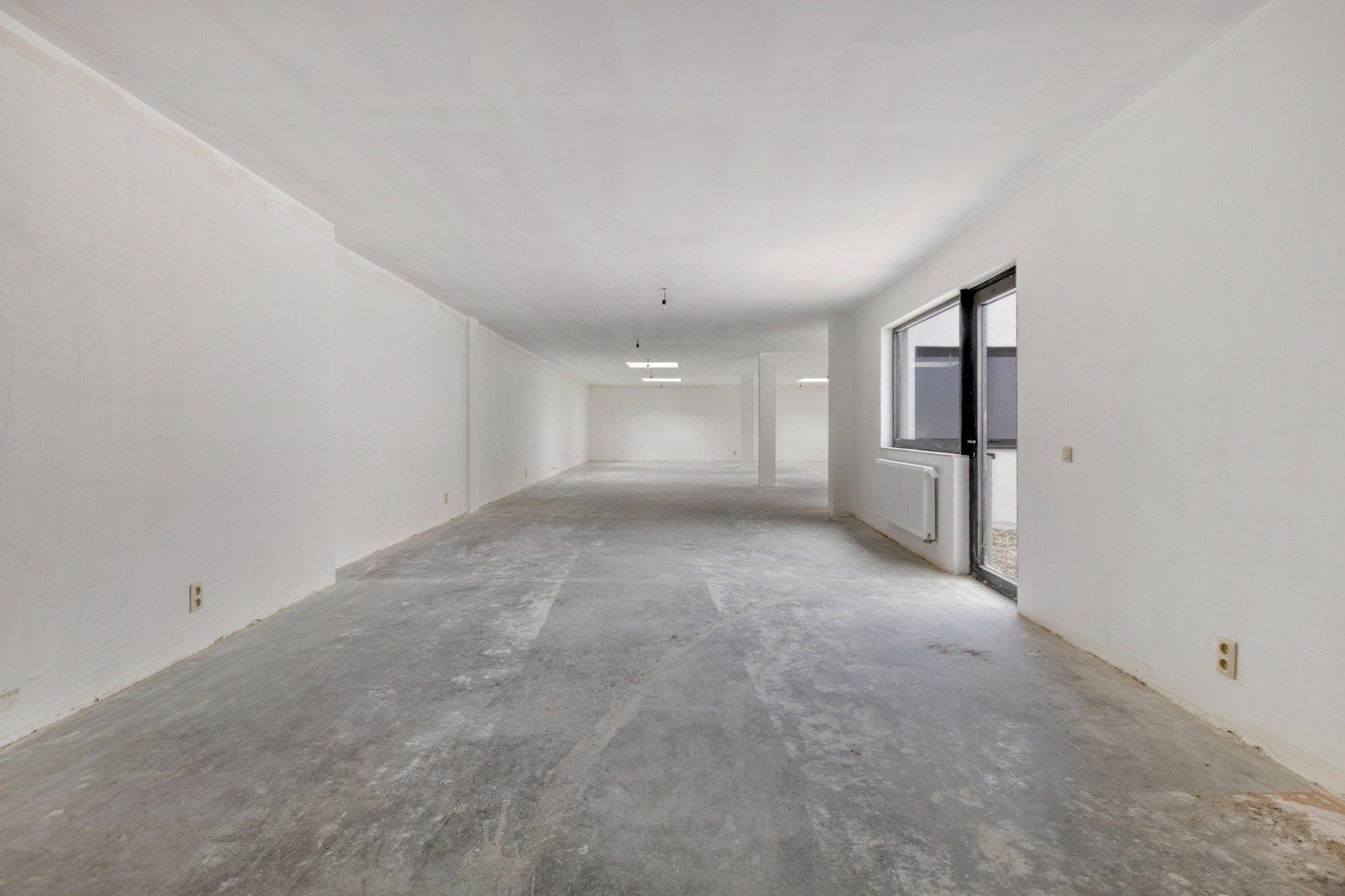 Ruime handelspand van 243 m² centraal gelegen in Mol centrum !  foto 9