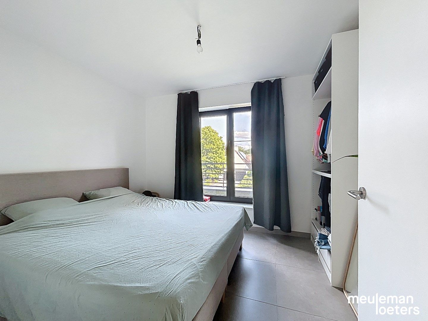 Stijlvol appartement met  zuidgericht terras foto 9