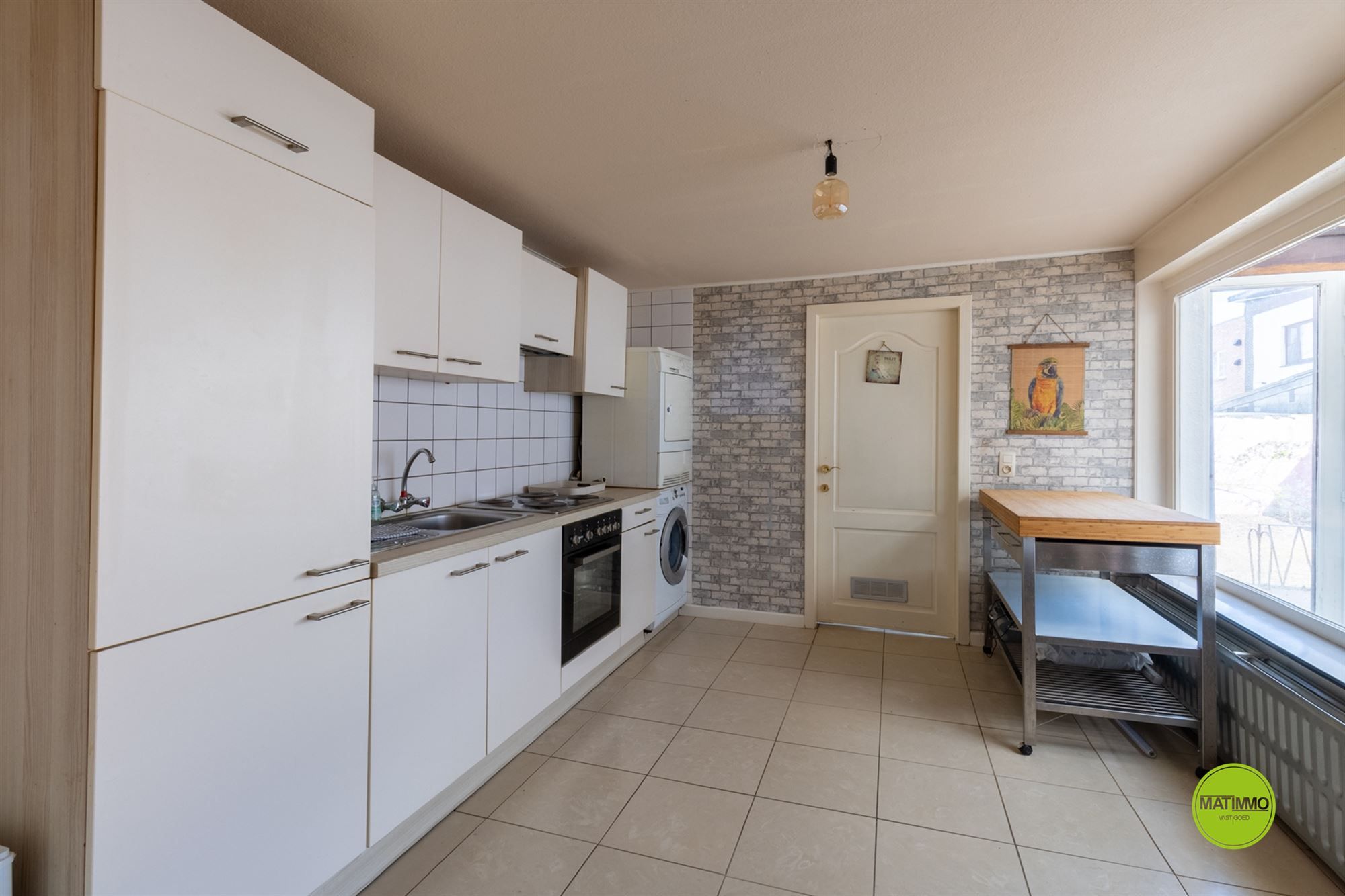 Handelshuis met woonruimte in hartje Beverlo foto 12