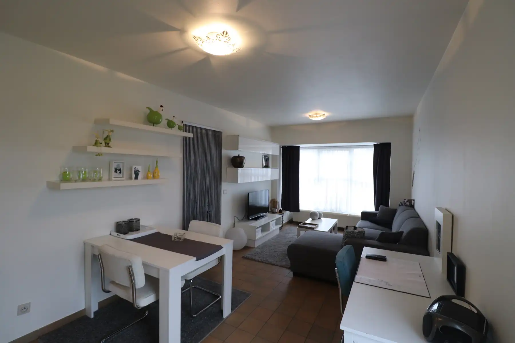 Een rustig gelegen appartement met kelderberging en autostaanplaats foto 3