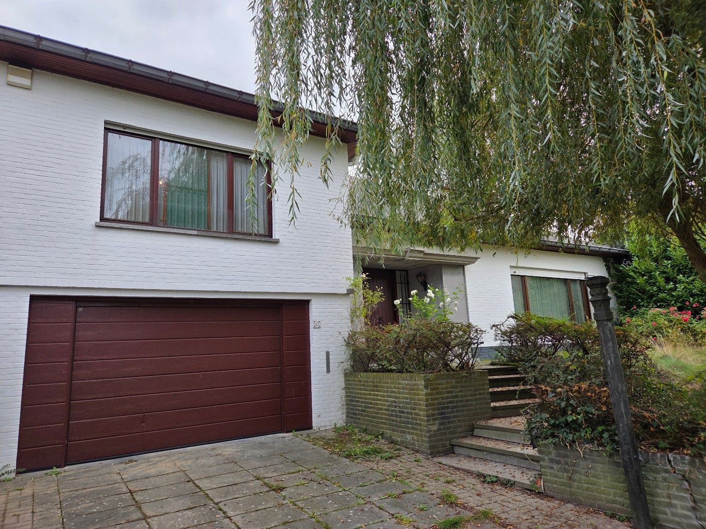 Hoofdfoto van de publicatie: Ruime te renoveren woning met aanpalende gronden voor een totale oppervlakte van 12860 m²!