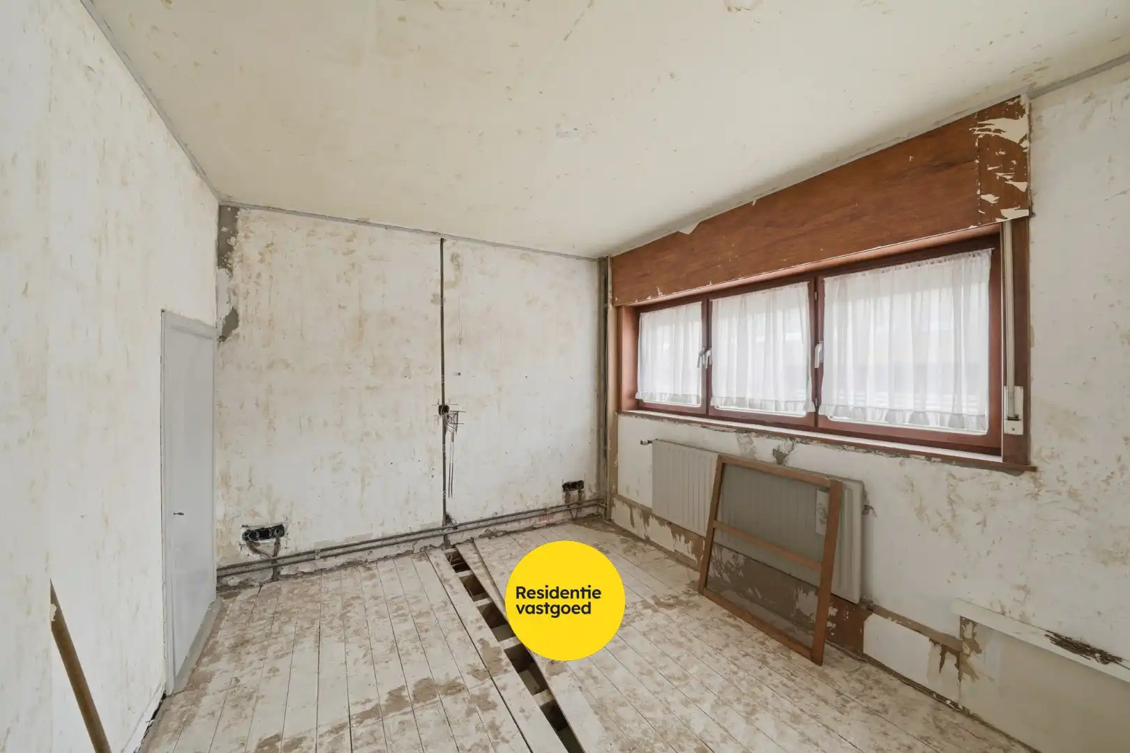 Te renoveren woning met garage en tuin in de Vuurtorenwijk te Oostende foto 11