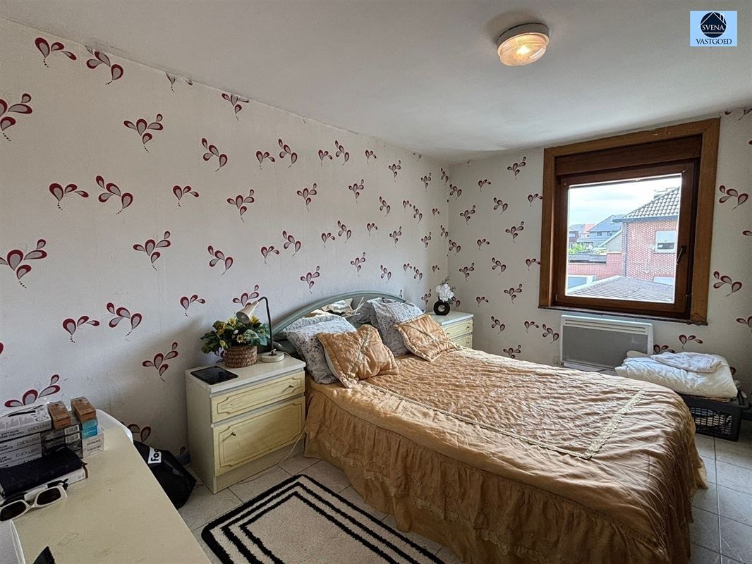 WONING MET 5 SLAAPKAMERS EN STADSTUINTJE. foto 7