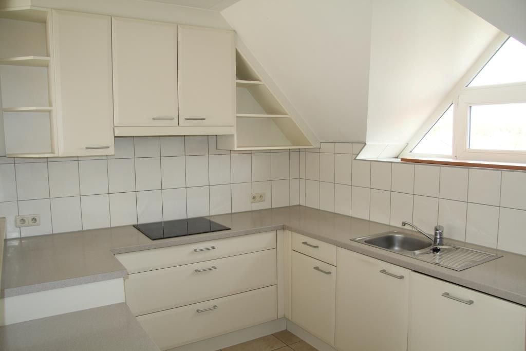 Ruim dakappartement met 2 slk, terras en garage foto 6