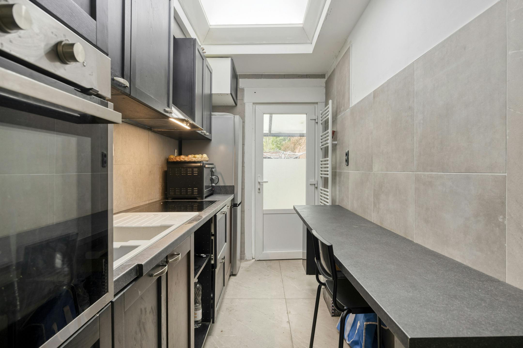 Gelijkvloersappartement met 1 slaapkamer en tuin te koop in Hoboken foto 5