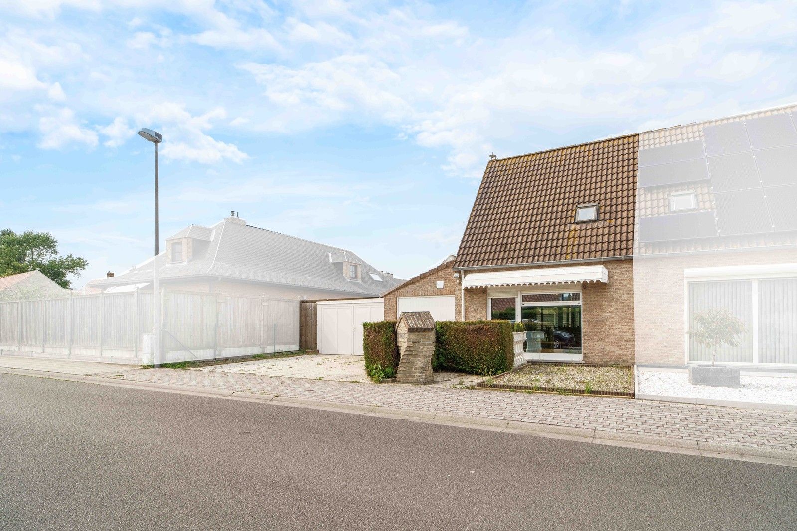 Charmante, halfopen woning in centrum Westende foto 23