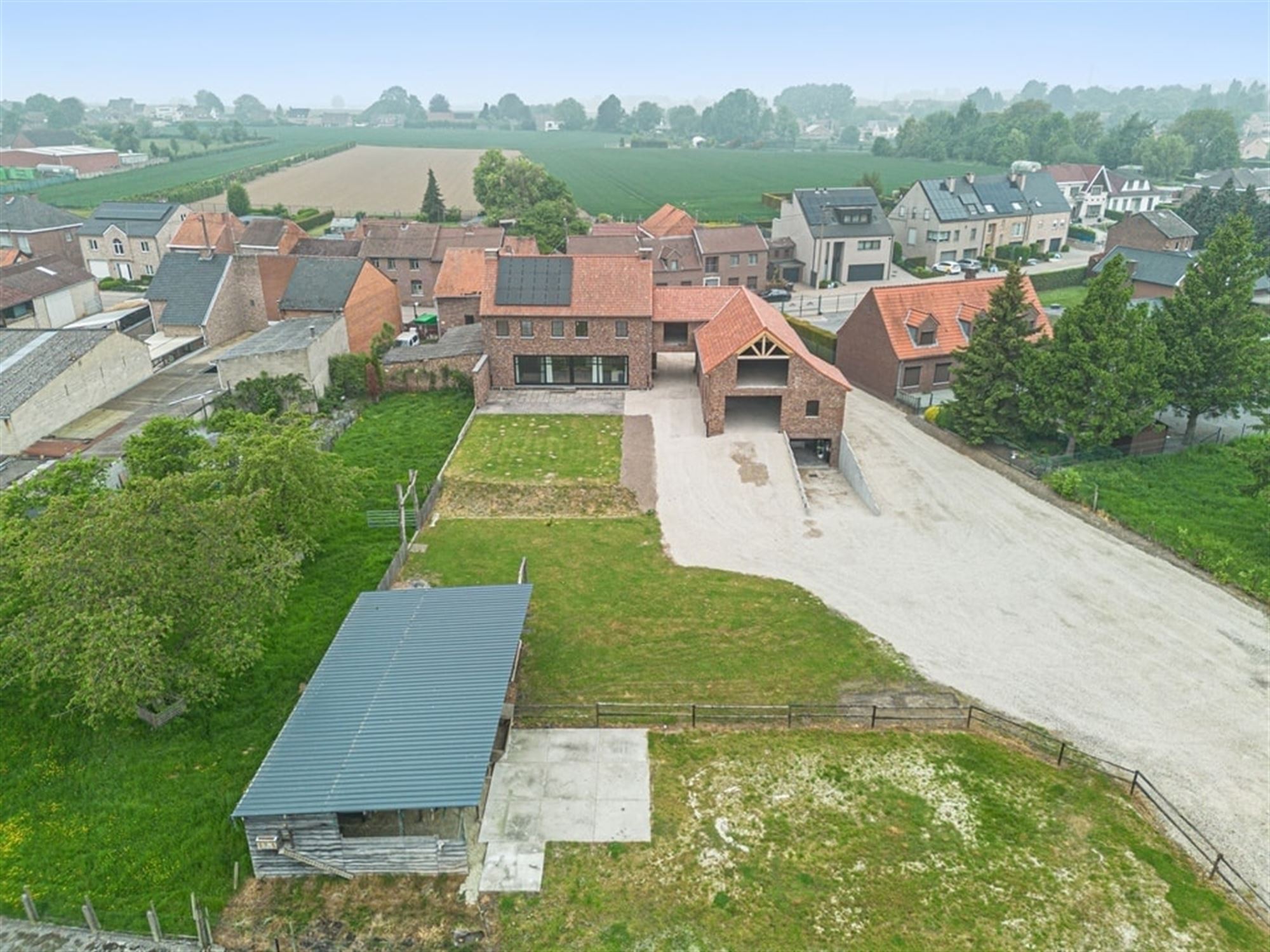 UNIEKE LANDELIJKE GEZINSWONING MET BIJBOUW VAN 320M² OP PRACHTIG PERCEEL  foto 3