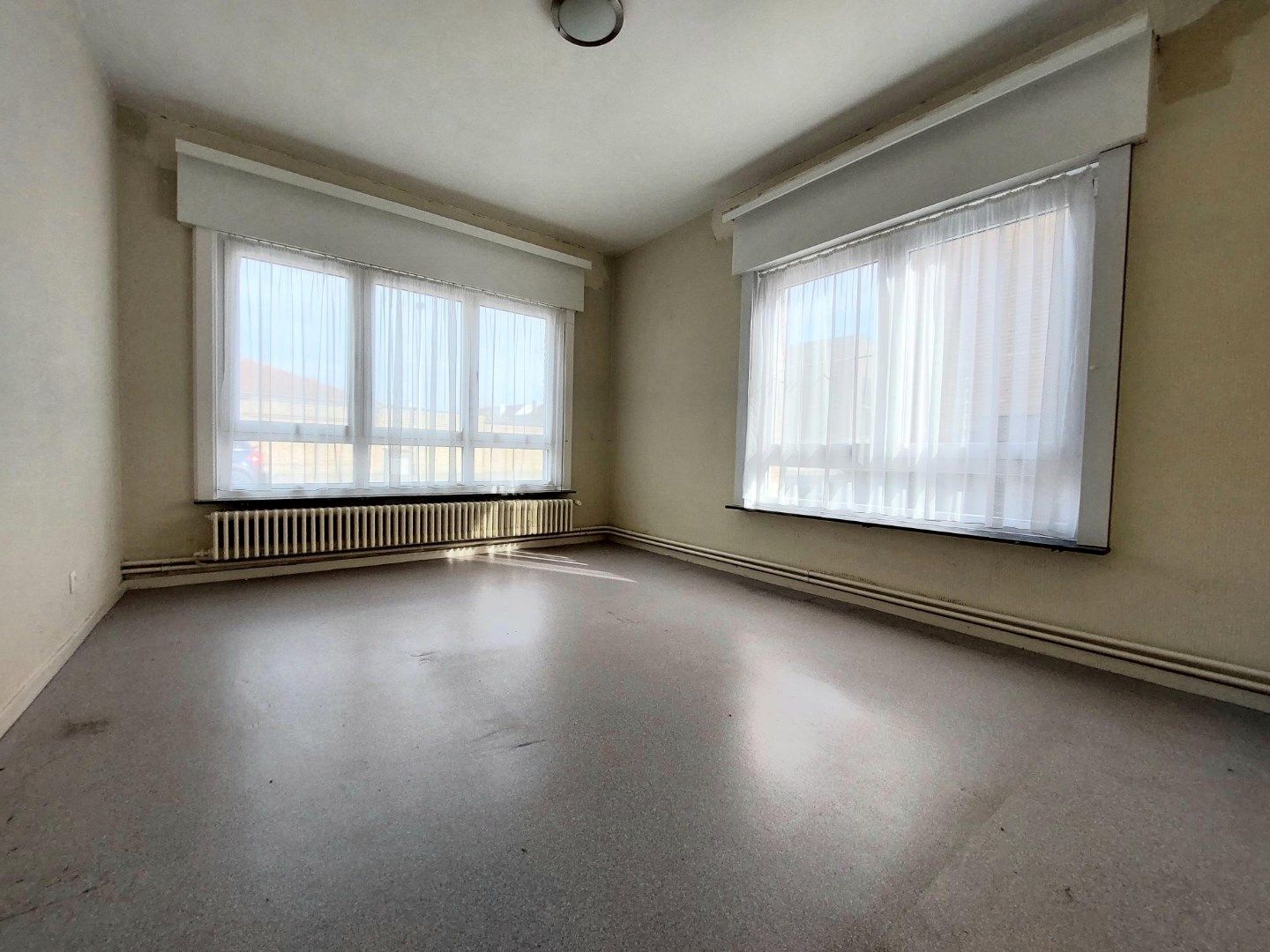 Gelijkvloersappartement met terras en garage foto 10