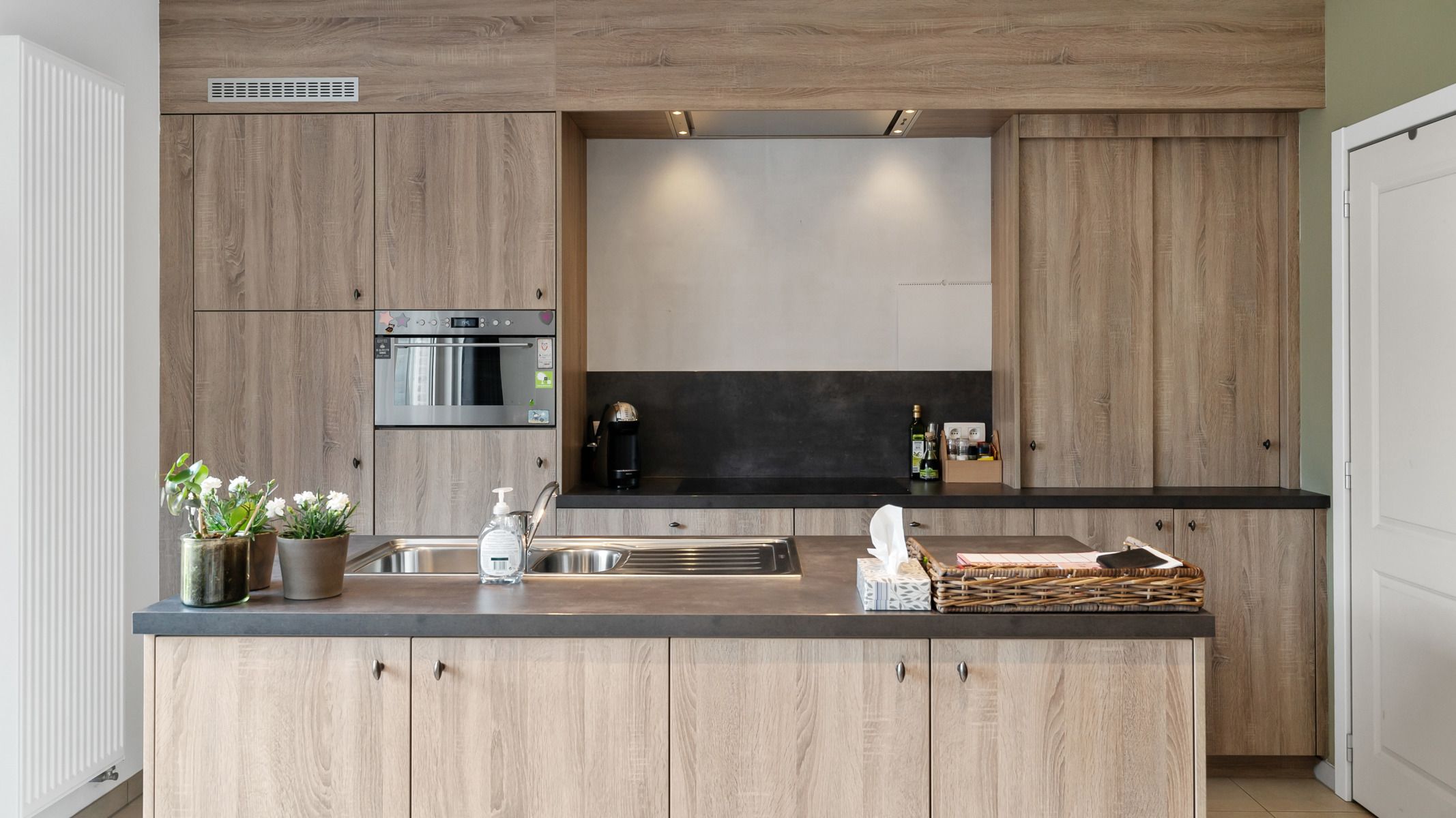 Gelijkvloers appartement met tuin en 2 autostaanplaatsen (1 ondergronds met berging en 1 bovengronds) foto 7