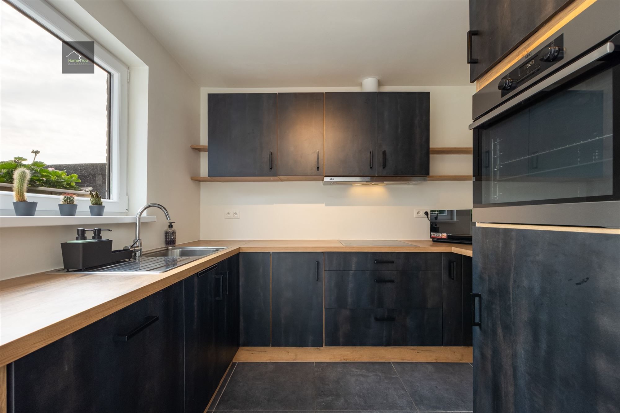 Gelijkvloers appartement met zeer grote tuin foto 8