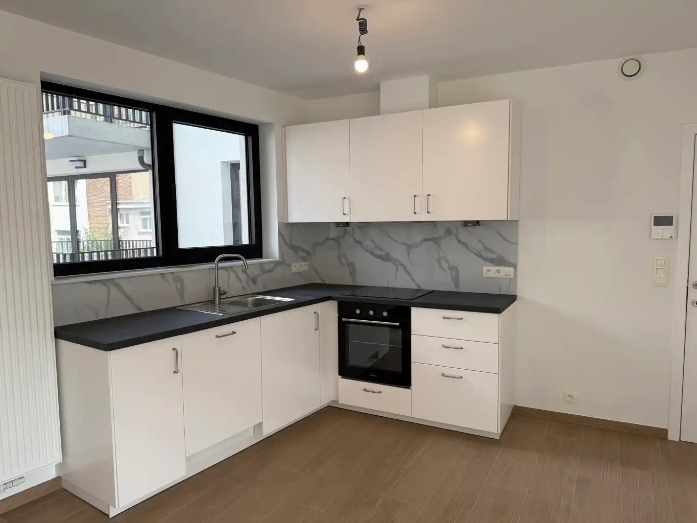 Nieuwbouw appartement met 3 slpks, terras en kelder foto 4