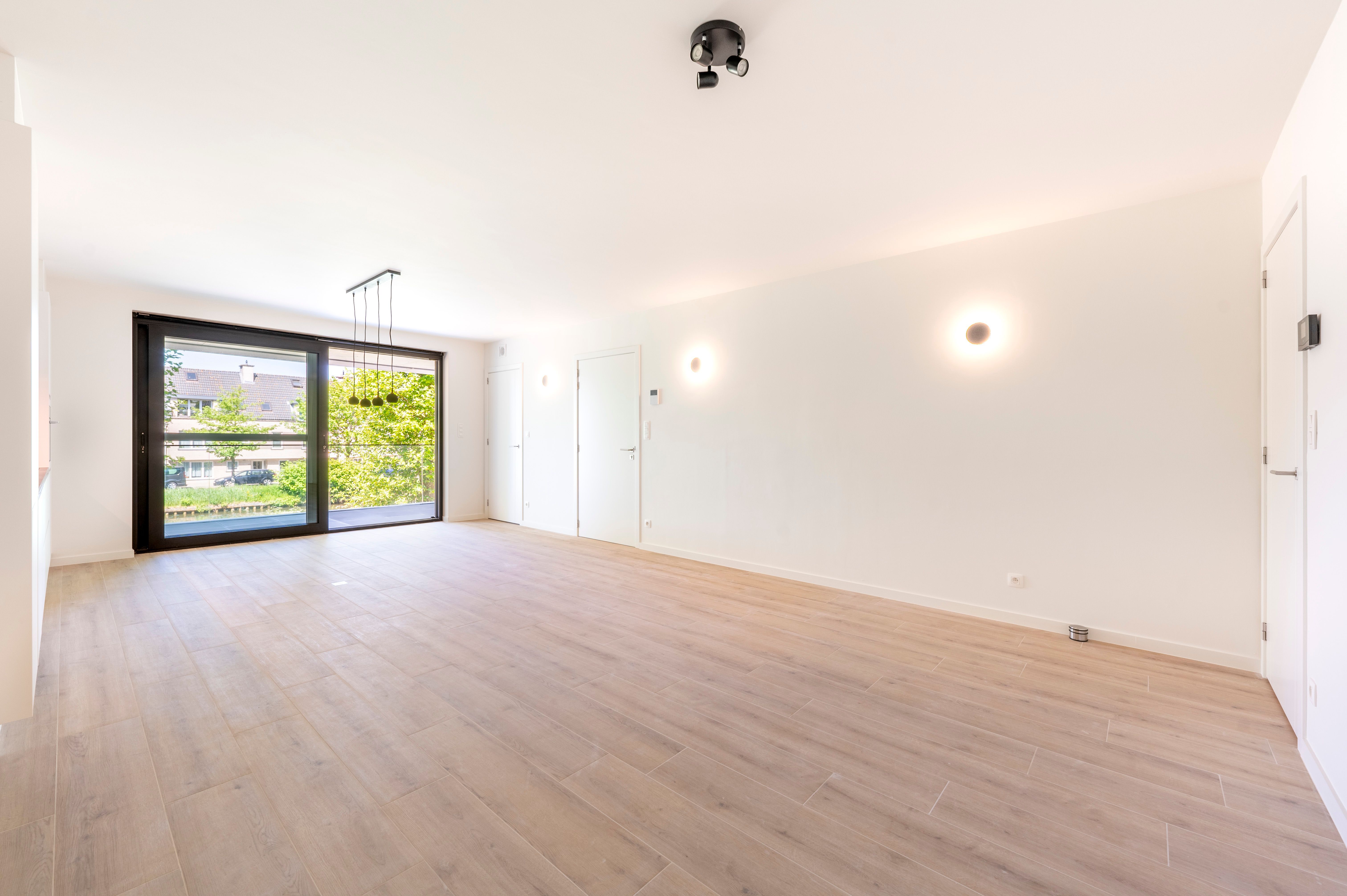 Stijlvol nieuwbouwappartement met uniek zicht op de Vaart van Schoten. foto 8