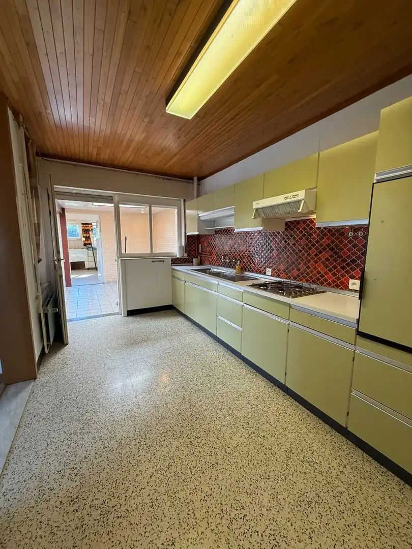 Ruime woning met 2 slaapkamers, veranda en volledig omheinde tuin te Heppen foto 14