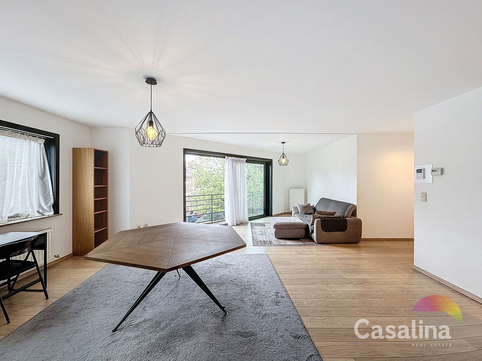 Moderne duplex 95m² met terras, parking en kelder foto 2